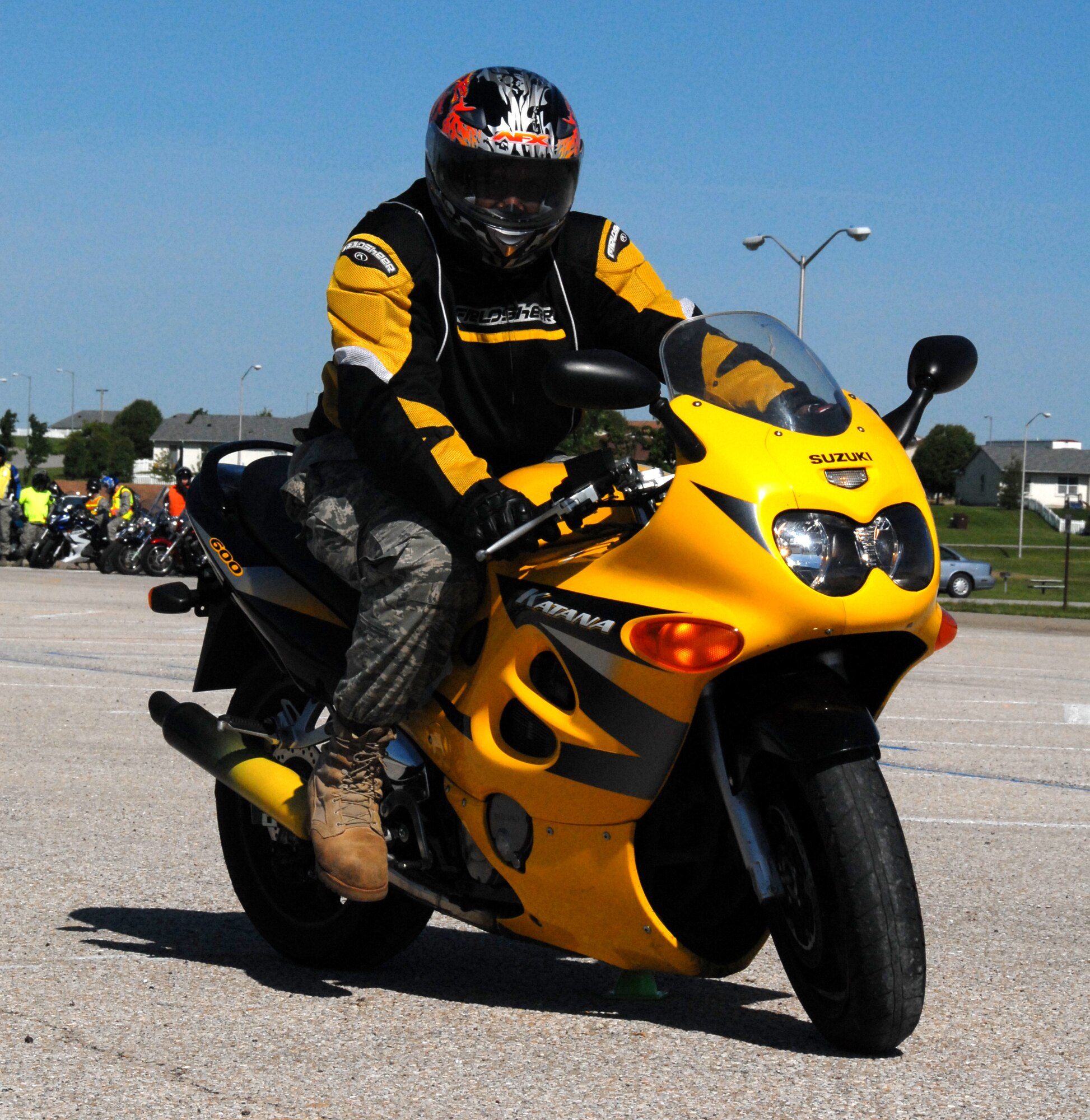 A participant in the motorcycle-safety portion of Safety Day at Whiteman Air Force Base, Mo., manuvers his bike through the motorcycle course. The entire base observed a safety day May 18, 2009.  (U.S. Air Force photo/Master Sgt. Bill Huntington)