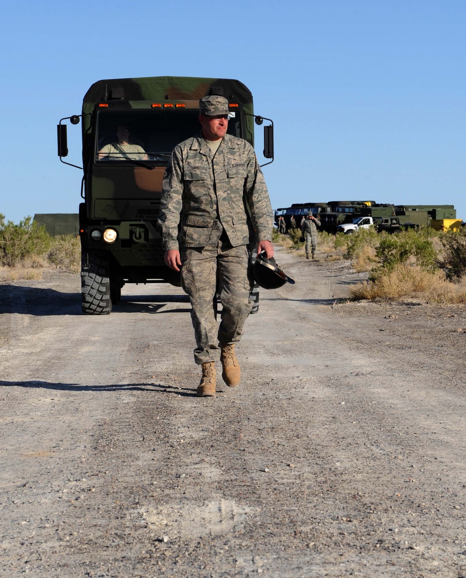 WENDOVER, Utah – Tech. Sgt. Corey Davis, 726th Air Control Squadron ground radio systems superintendent, leads a five-ton vehicle to a site at Wendover, Utah, during a week-long exercise May 8. The 726th ACS tackles a wide-spread mission including enemy surveillance and identification, weapons control, joint and combined data-link connectivity, and battle management of offensive and defensive air activities. The squadron is made up of 27 different Air Force career fields, making it self-sustaining and able to deploy and fully operate without external support or help. (U.S. Air Force photo\Airman 1st Class Debbie Lockhart)
