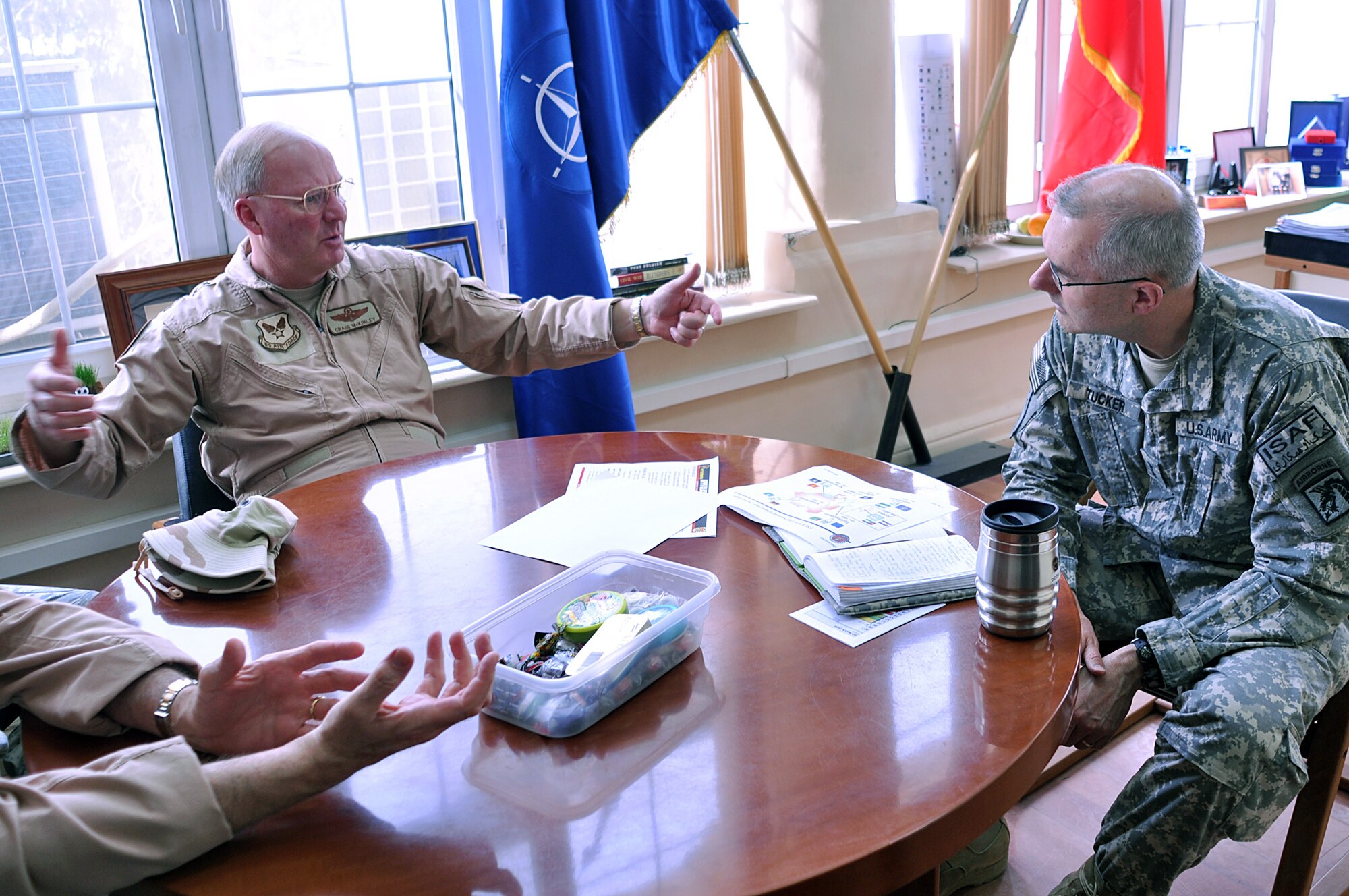 Gen. Craig R. McKinley, chief of the National Guard Bureau, speaks with the
deputy commander for operations, U.S. Forces Afghanistan, Army Maj. Gen.
Michael S. Tucker, in Kabul, Afghanistan, March 2 about Citizen-Soldiers and
-Airmen serving in Operation Enduring Freedom as well as Guard-initiated
programs being employed.