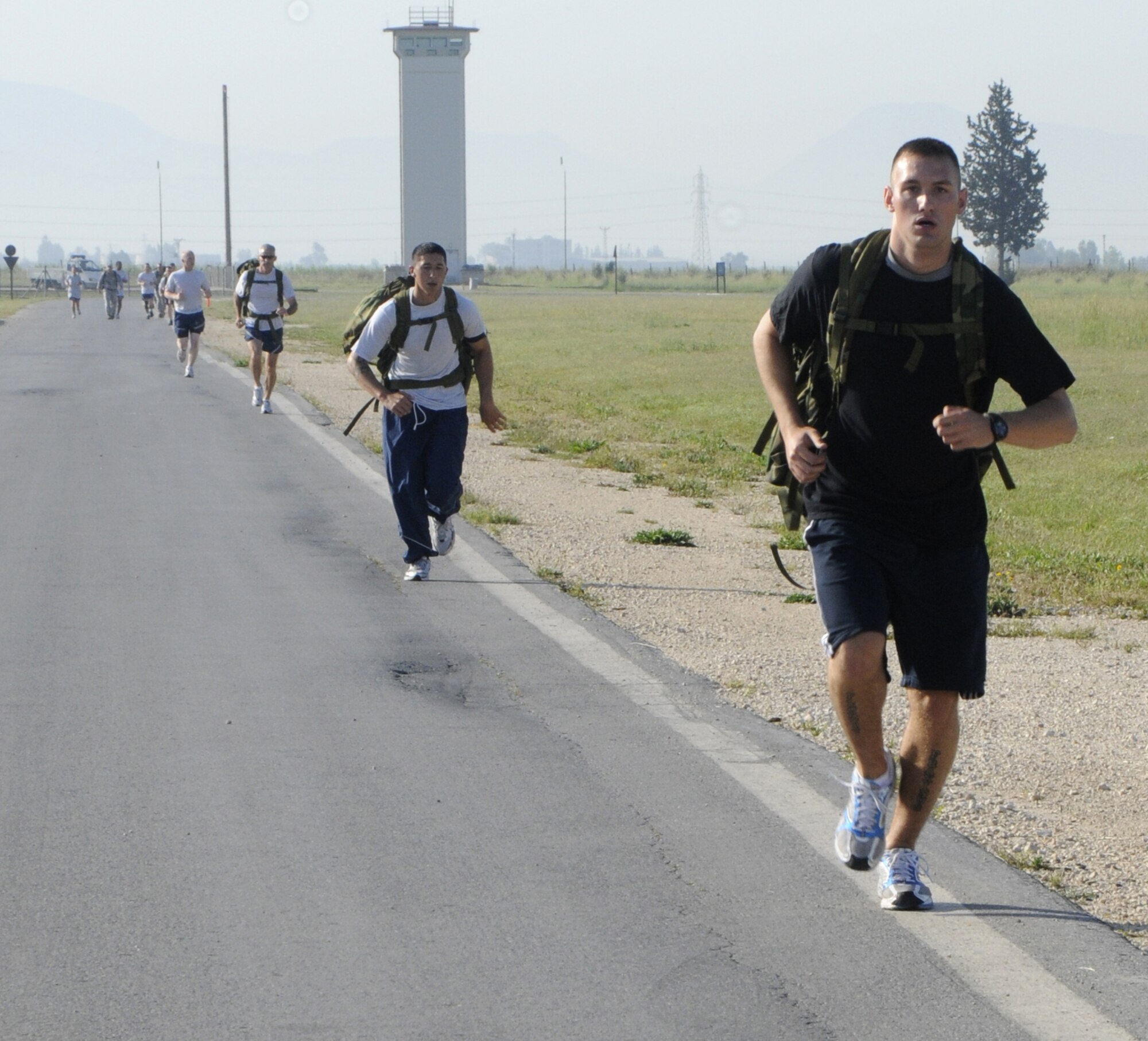 Airman 1st Class Brandon Ashcraft, 39th Civil Engineer Squadron, takes the front and leads the way during Police Week’s ruck sack march May 15, 2009 at Incirlik Air Base, Turkey. In the end, Airman Ashcraft was the second individual to finish. More than 30 Airmen participated in the event, carrying about 30 pounds of field equipment in their ruck’s, and walked or ran Incirlik’s 2.25 mile “Triangle”.  (U.S. Air Force photo/Airman 1st Class Amber Russell)