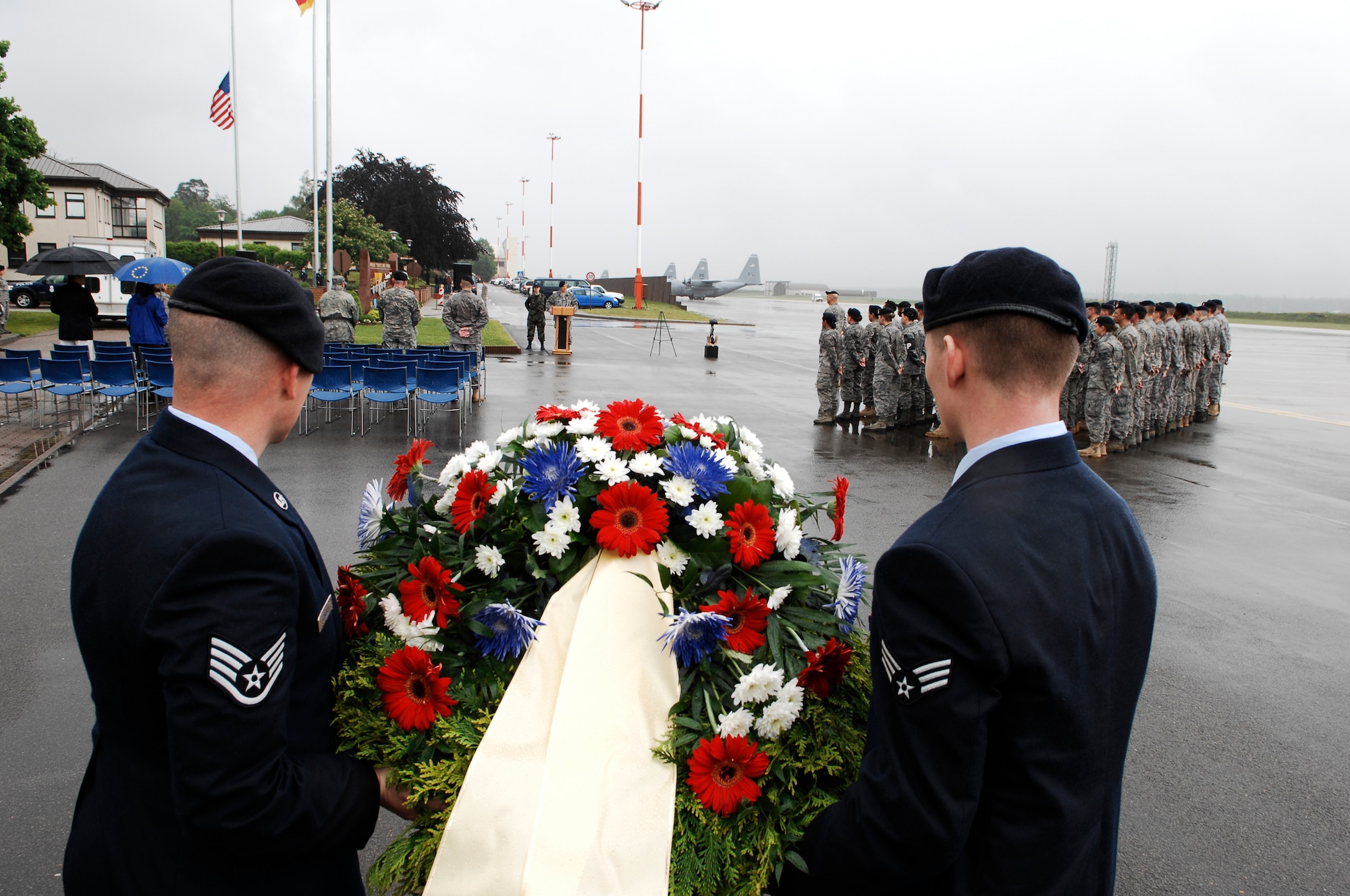 United States Air Force Staff Sgt. Kyle Richards (left) and Senior Airman Joshuah Westmoreland, 435th Security Forces Squadron, laid a wreath during a Final Guard Mount Ceremony, May 15, 2009, Ramstein Air Base, Germany. Final Guard Mount is one of many events taking place in celebration of National Police Week, a solemn period each year where every officer reflects on those who have fallen. (U.S. Air Force photo by Senior Airman Amber Bressler)