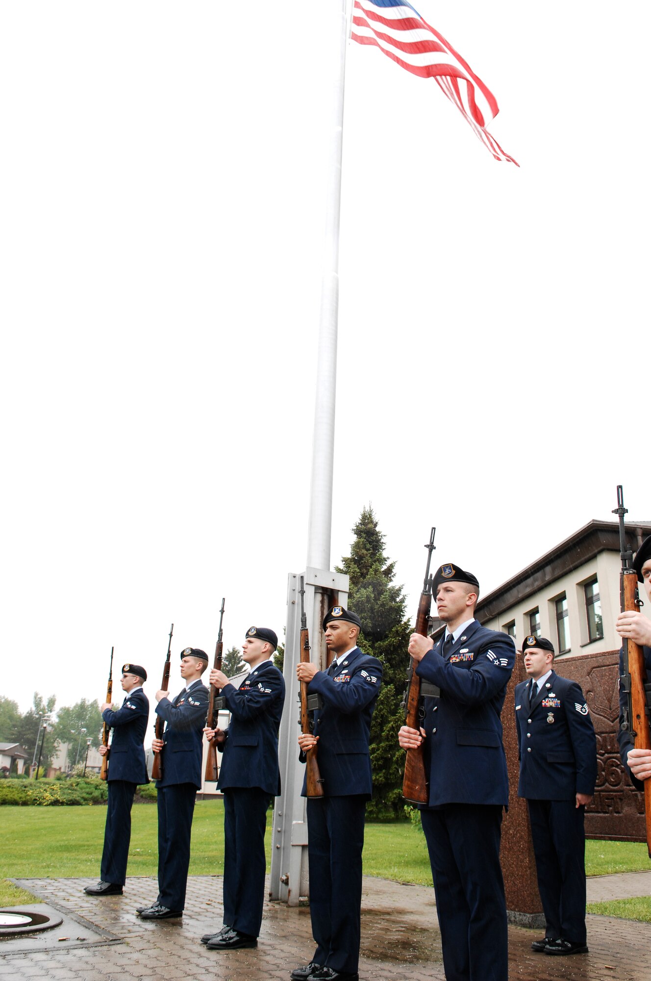 Members from police units in the Kaiserslautern Military Community conduct a 21-gun salute during a Final Guard Mount Ceremony, May 15, 2009, Ramstein Air Base, Germany. Final Guard Mount is one of many events taking place in celebration of National Police Week, a solemn period each year where every officer reflects on those who have fallen. (U.S. Air Force photo by Senior Airman Amber Bressler)
