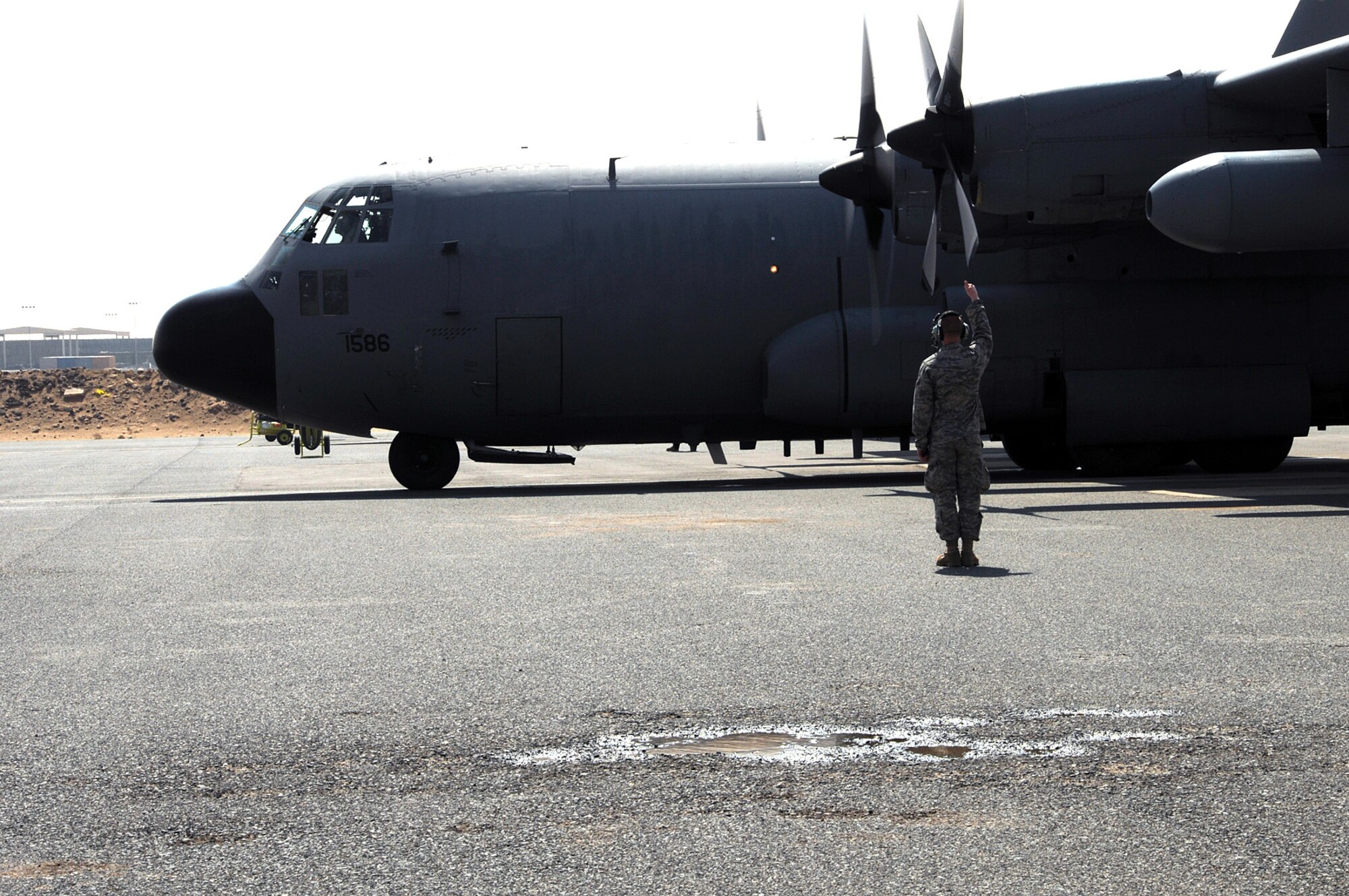 SOUTHWEST ASIA -- An EC-130 Compass Call aircraft prepares to take off from an air base in Southwest Asia March 31. The 43rd Expeditionary Electronic Combat Squadron flew their 3,000th combat sortie May 19 after five years of continuous deployment. (U.S. Air Force photo by Senior Airman Courtney Richardson)