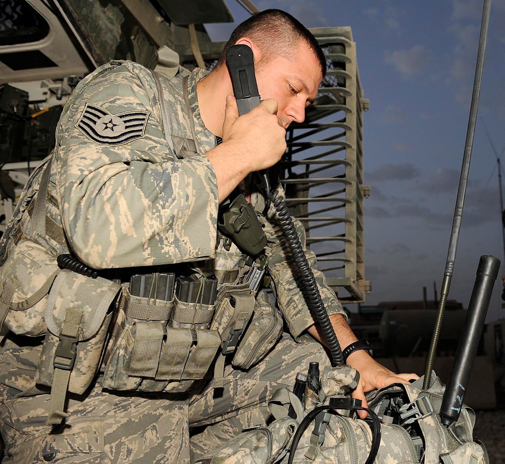 Tech. Sgt. Ben Jenkins, 82nd Expeditionary Air Support Operations Squadron tactical command and control specialist, does a radio check to make sure the portable radio is working correctly before going out on a mission, Camp Liberty, Iraq May 13, 2009. Sergeant Jenkins is a part of the Tactical Air Control Party working to ensure the soldiers on the ground have the air support they need to get their mission done. Sergeant Jenkins is deployed from Fort Riley, Kan. and a native of Milan, Tn.  (U.S. Air Force photo by Senior Airman Jacqueline Romero)