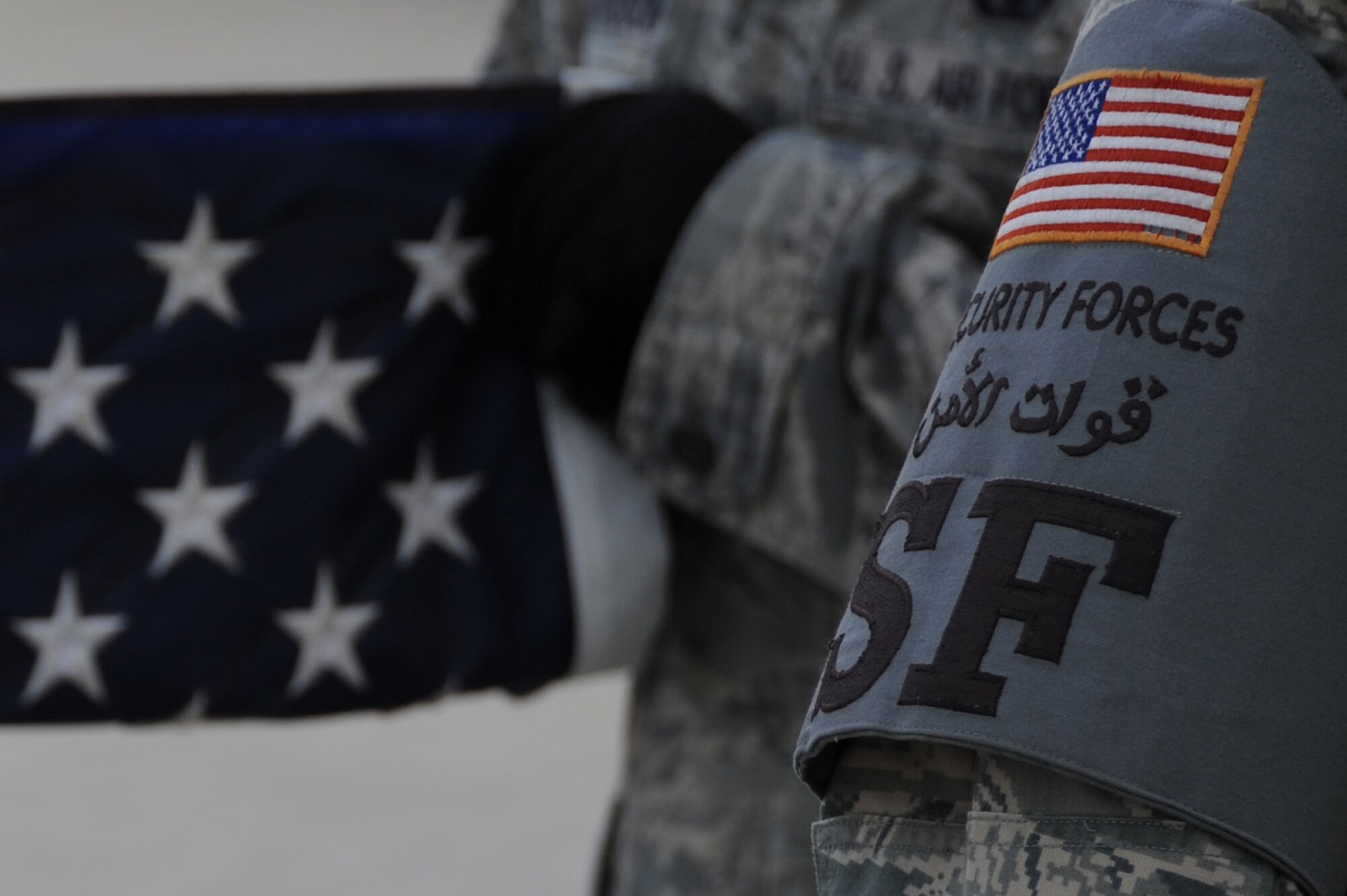 SOUTHWEST ASIA - Members of the 380th Expeditionary Security Forces Squadron and Office of Special Investigation performed a retreat ceremony to honor the service and sacrifice of U.S. law enforcement officials during National Police Week, May 15 at an undisclosed location in Southwest Asia. Names of fallen ESFS and OSI members were read followed by a moment of silence with the retreat ceremony concluding the event. (U.S. Air Force photo by Senior Airman Brian J. Ellis) (Released)