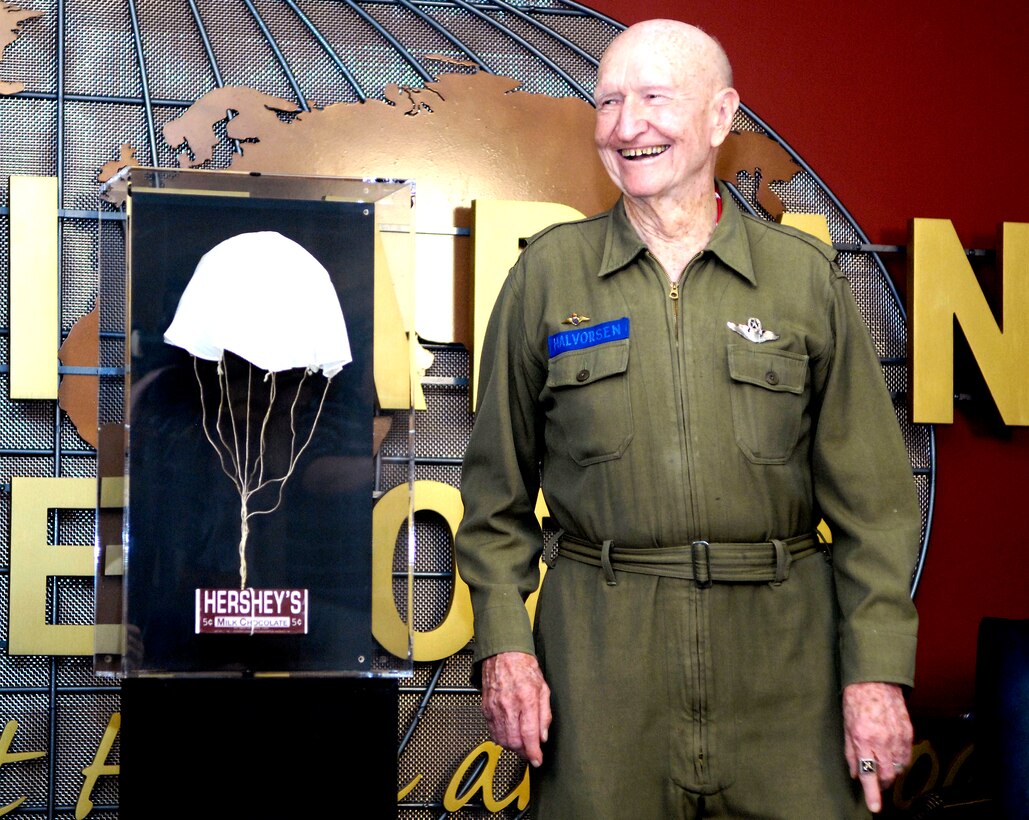 Retired Air Force Col. Gail Halvorsen stands next to a handkerchief parachute artifact that will be displayed in the new Defense Humanitarian Relief Corridor dedicated in the Pentagon, May 19, 2009. Halvorsen dropped candy-laden parachutes from his aircraft to Berlin children during the Berlin Airlift, earning the nickname "Candy Bomber." DoD photo by Navy Petty Officer 1st Class Molly A. Burgess