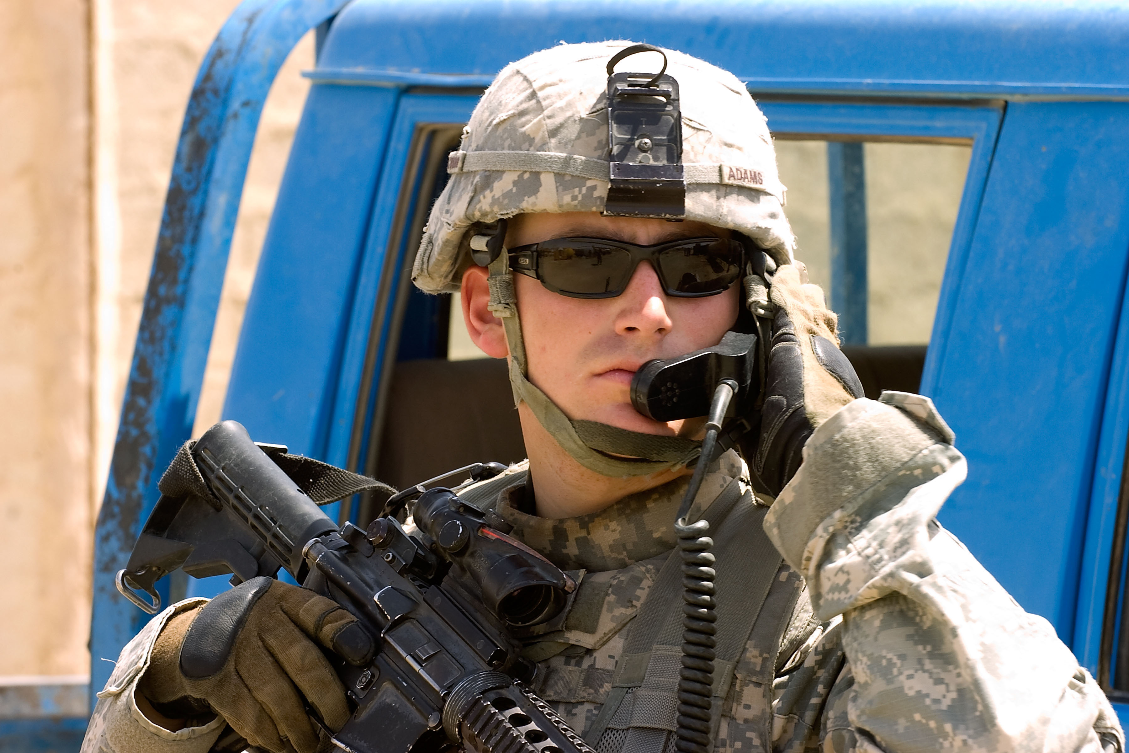 U S Army Sgt Nathaniel Adams Talks With An Helicopter Pilot During A 