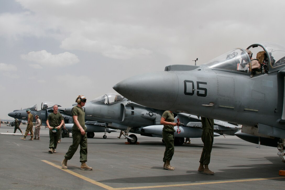 Yuma's Marine Attack Squadron 214 maintenance personnel prepare to move the squadron’s AV-8B Harriers at the Kandahar Air Base, Afghanistan, May 19, 2009. The squadron, which falls under the recently activated Marine Aircraft Group 40, is currently preparing for combat missions.