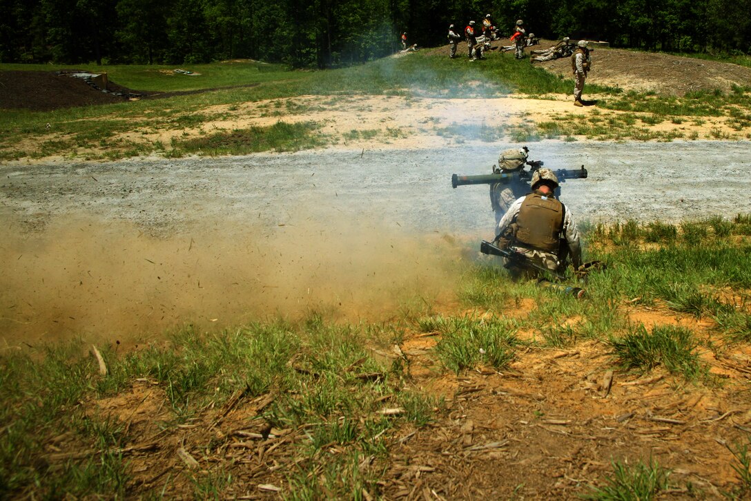 A Marine with 1st Battalion, 9th Marine Regiment, 2nd Marine Division fires a shoulder mounted multi-purpose assault weapon during the infantry platoon battle course, part of the unit’s training evolution, here, May 19. (U.S. Marine Corps Photo by Cpl. Joseph Lambach)(RELEASED)