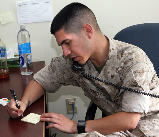 Legal services specialist Lance Cpl. Albert Godoy takes a phone message at the Legal Services Support Section, 2nd Marine Logistics Group, here, May 20. Marine Corps Base Camp Lejeune’s LSSS has the biggest docket in the entire Department of Defense. (Official U.S. Marine Corps photo by Lance Cpl. John A. Faria) (RELEASED)
