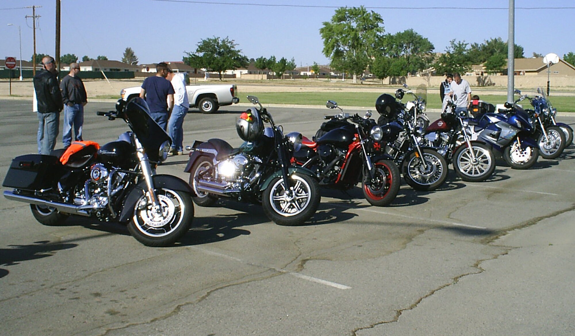 Motorcyclists from across Team Edwards gather in the Chapel 2 parking lot May 16 to pray for their safey as well as the safety of all motorists during the 101 critical days of summer. A safety represenative was on hand to discuss safety procedures for the participants. (Air Force photo/Major Philip S. Llanos) 