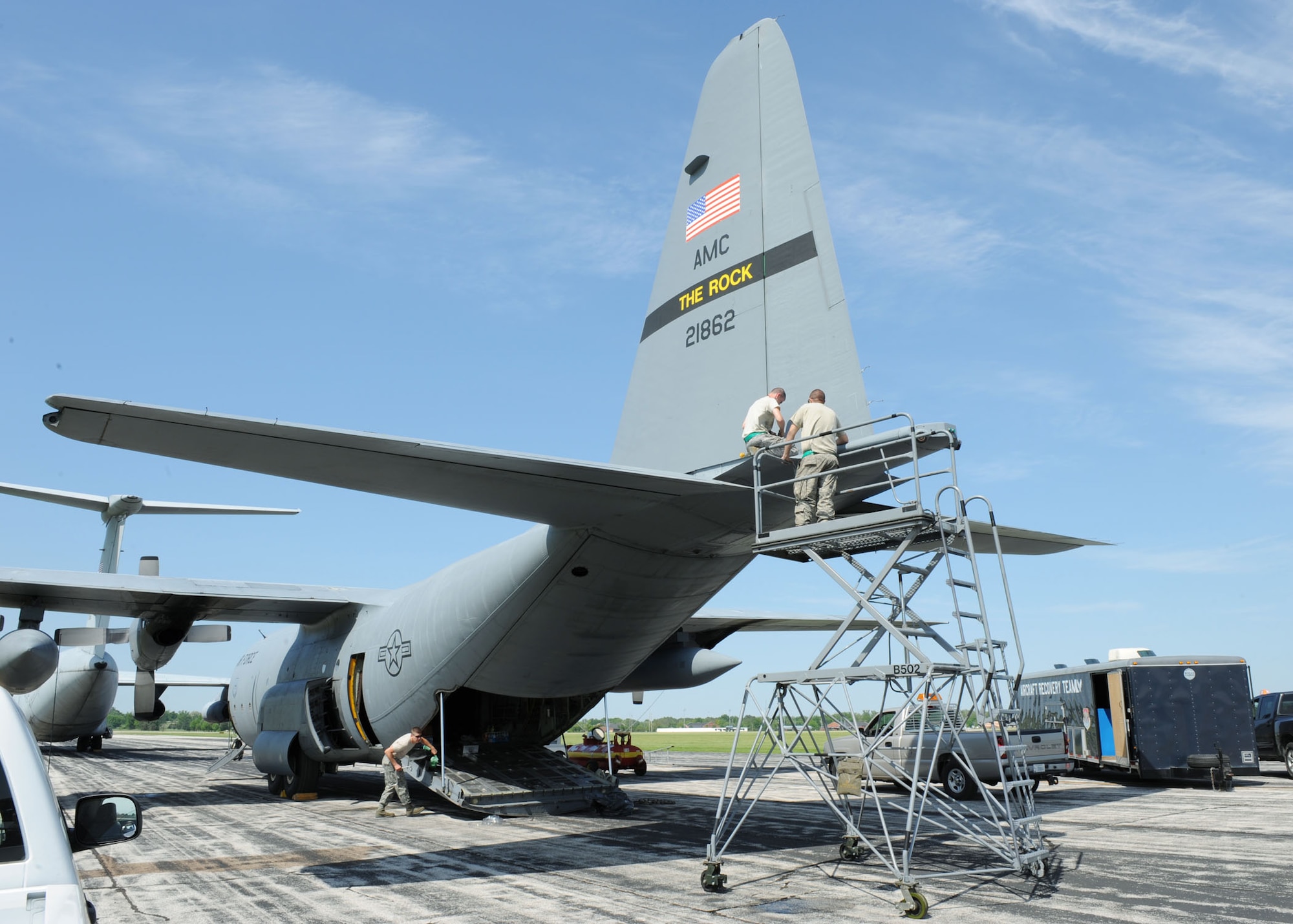SCOTT AIR FORCE BASE, Ill. -- Airmen from the 19th Maintenance Squadron work on the C130-E to prepare it for placement at Scott Field Heritage Airpark. (U.S. Air Force photo/Airman 1st Class Tristin English)