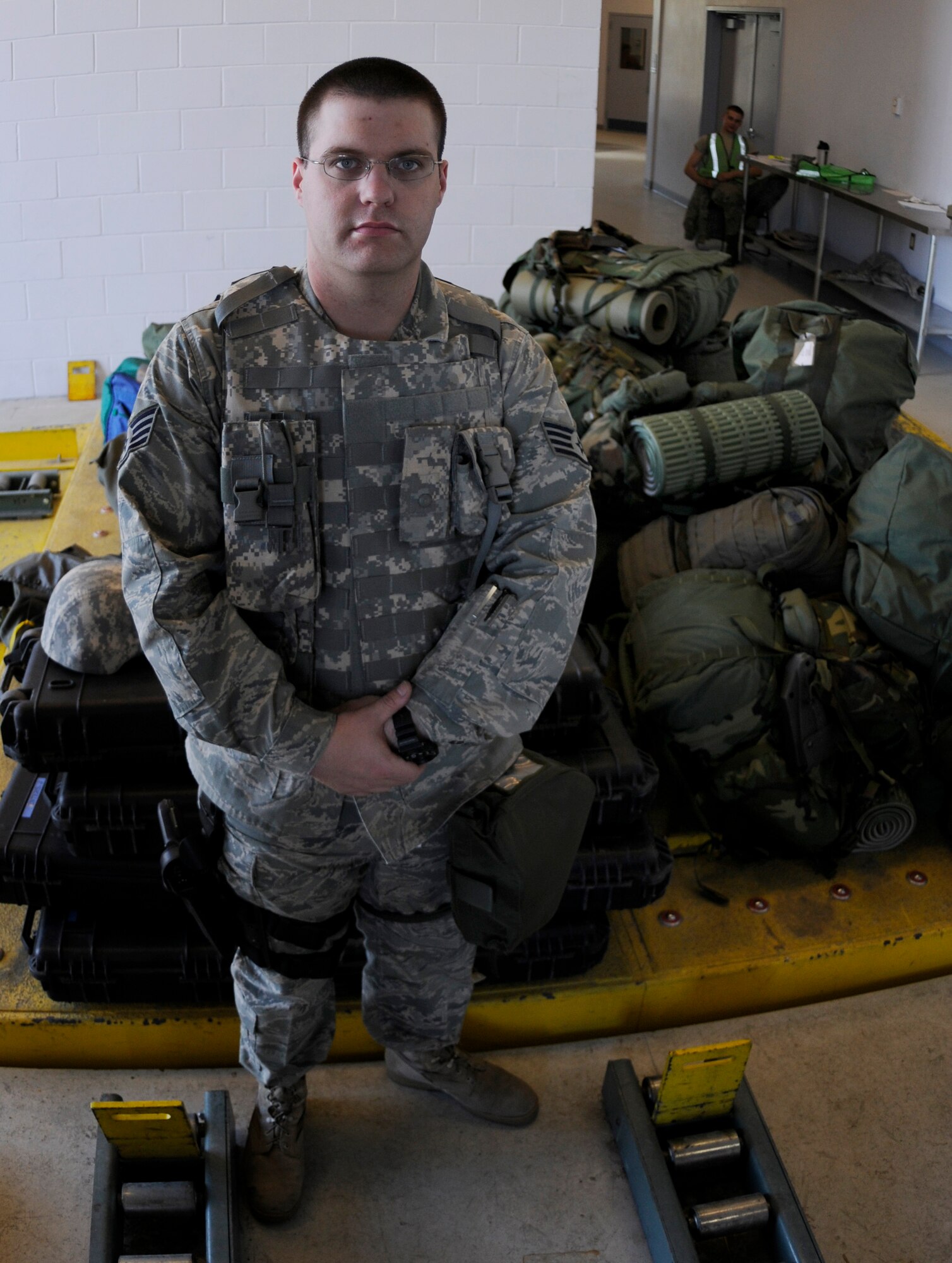 Staff Sgt. Justin Stuart stands guard over weapons and sensitive items during an operational readiness exercise May 18, 2009, Eielson Air Force Base, Alaska.  The exercise trains Airmen how to handle different situations during a mass deployment to support operations in the Pacific Region. Sergeant Stuart is with the 168th Air Refueling Wing, Alaska Air National Guard, Security Forces Squadron. (U.S.  Air Force photo/Airman 1st Class Laura Max)