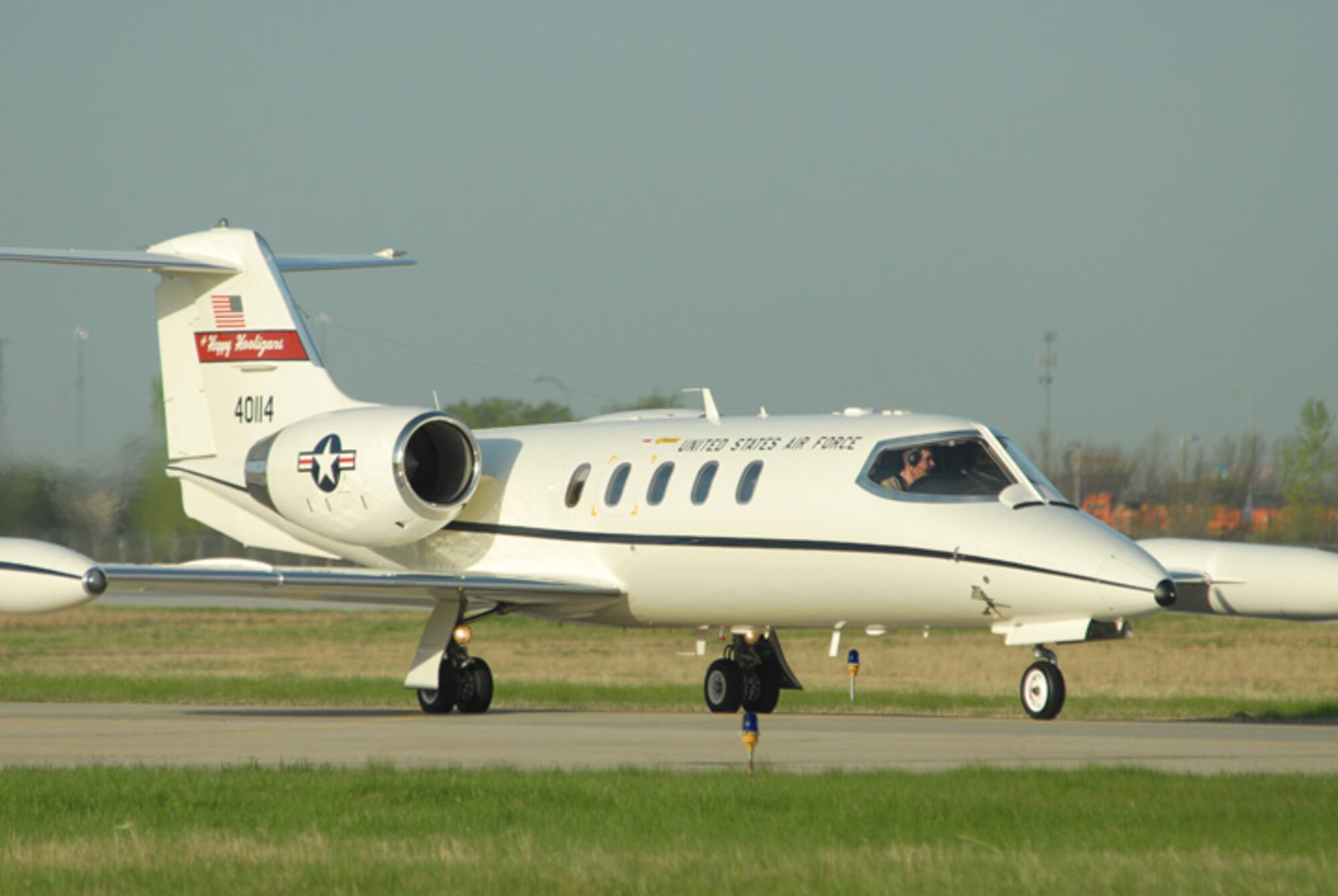 Capt. Christopher Domitrovich and 1 Lt. Treff Wagner, both of the 177th Airlift Squadron, North Dakota Air National Guard pilot a C-21 aircraft as they maneuver down the taxi-way prior to launch at Hector International Airport, Fargo, N.D. May 20.  This is the first time that the North Dakota Air National Guard C-21s have deployed to southwest Asia in support of Operation Enduring Freedom.  The Airmen will be supporting the mission in alternating shifts throughout the summer.  The 119th Wing began flying the C-21 Lear Jets after the unit lost their F-16 Fighting Falcons in January 2007.  (DoD photo by Senior Master Sgt. David H. Lipp) (Released)
