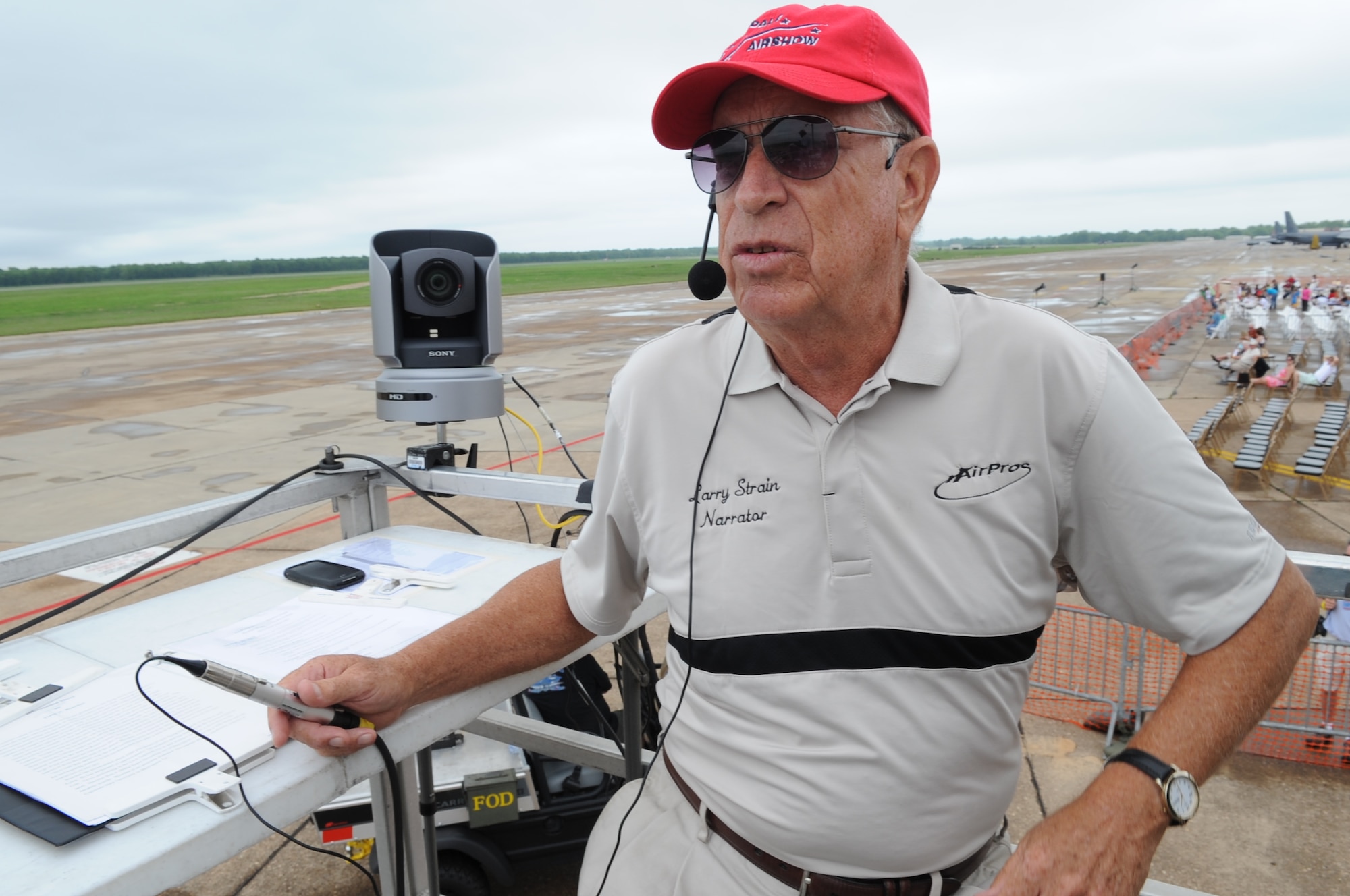 BARKSDALE AIR FORCE BASE, La. -- Larry Strain narrates during the 2009 Barksdale Defenders of Liberty Air Show. Mr. Strain has served the Barksdale open house crowd for 14 years by giving commentary throughout the show. He can be found at about 17 air shows every year. (U.S. Air Force photo by Senior Airman Alexandra M. Sandoval)(RELEASED)
