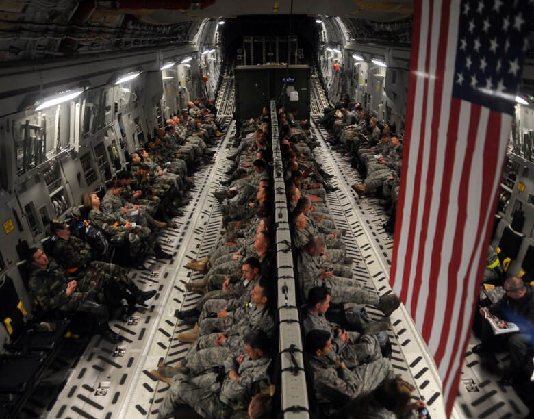 VOLK FIELD, Wisc. -- Airmen from the 375th Airlift Wing sit inside a C-17 aircraft for their flight home to Scott May 17 after participating in a weeklong training exercise at Volk Field, Wisc. For the exercise active duty, Air National Guard and Reserve Airmen teamed up to practice their wartime readiness skills. (U.S. Air Force photo/Airman 1st Class Wesley Farnsworth)