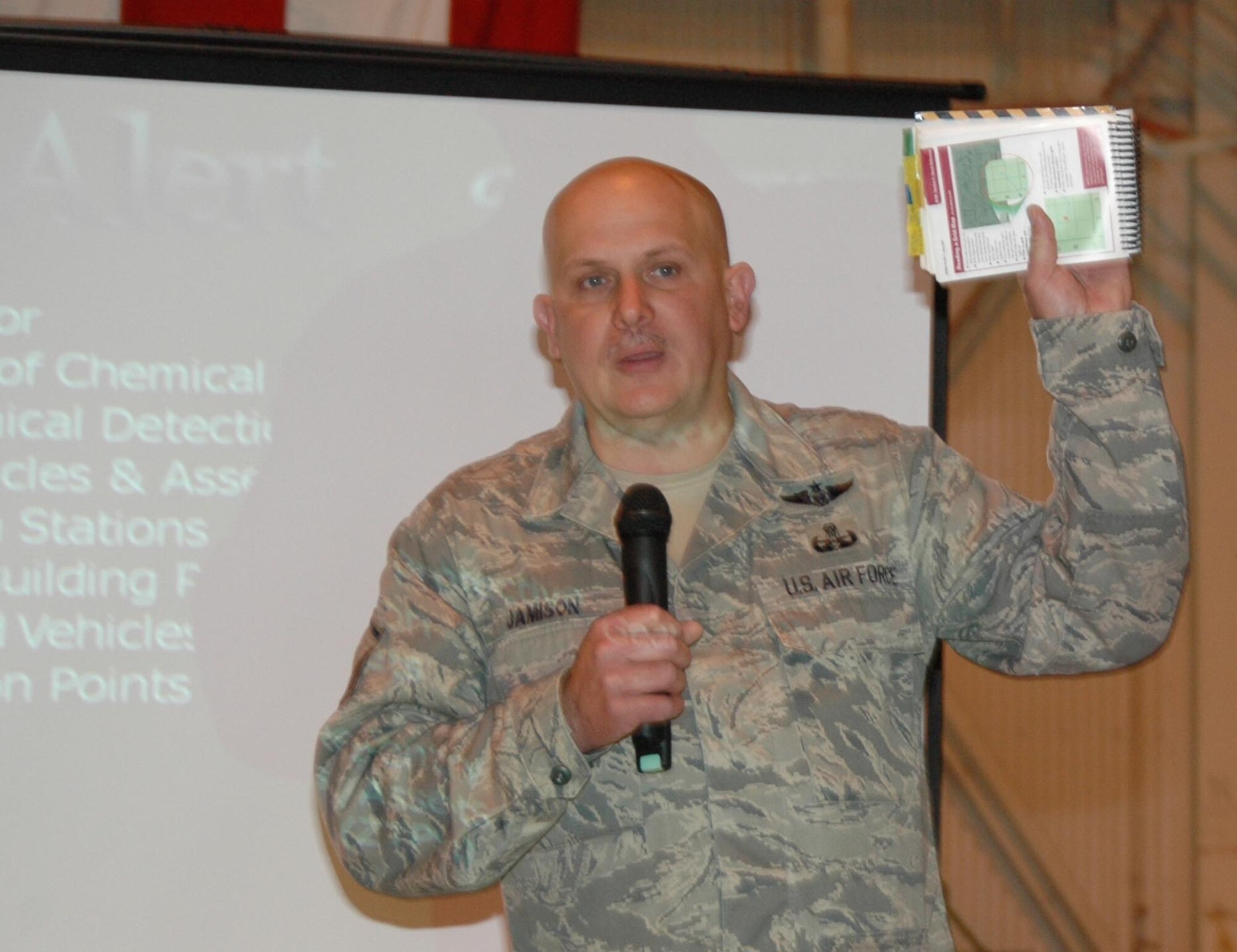 MCGUIRE AIR FORCE BASE, N.J. -- Master Sgt. Richard Jamison of the 514th Civil Engineering Squadron here, explains explosive ordinance recognition and map reading during the final Operational Readiness Inspection pep rally held May 17. (U.S. Air Force photo/Staff Sgt. Monica Dalberg)