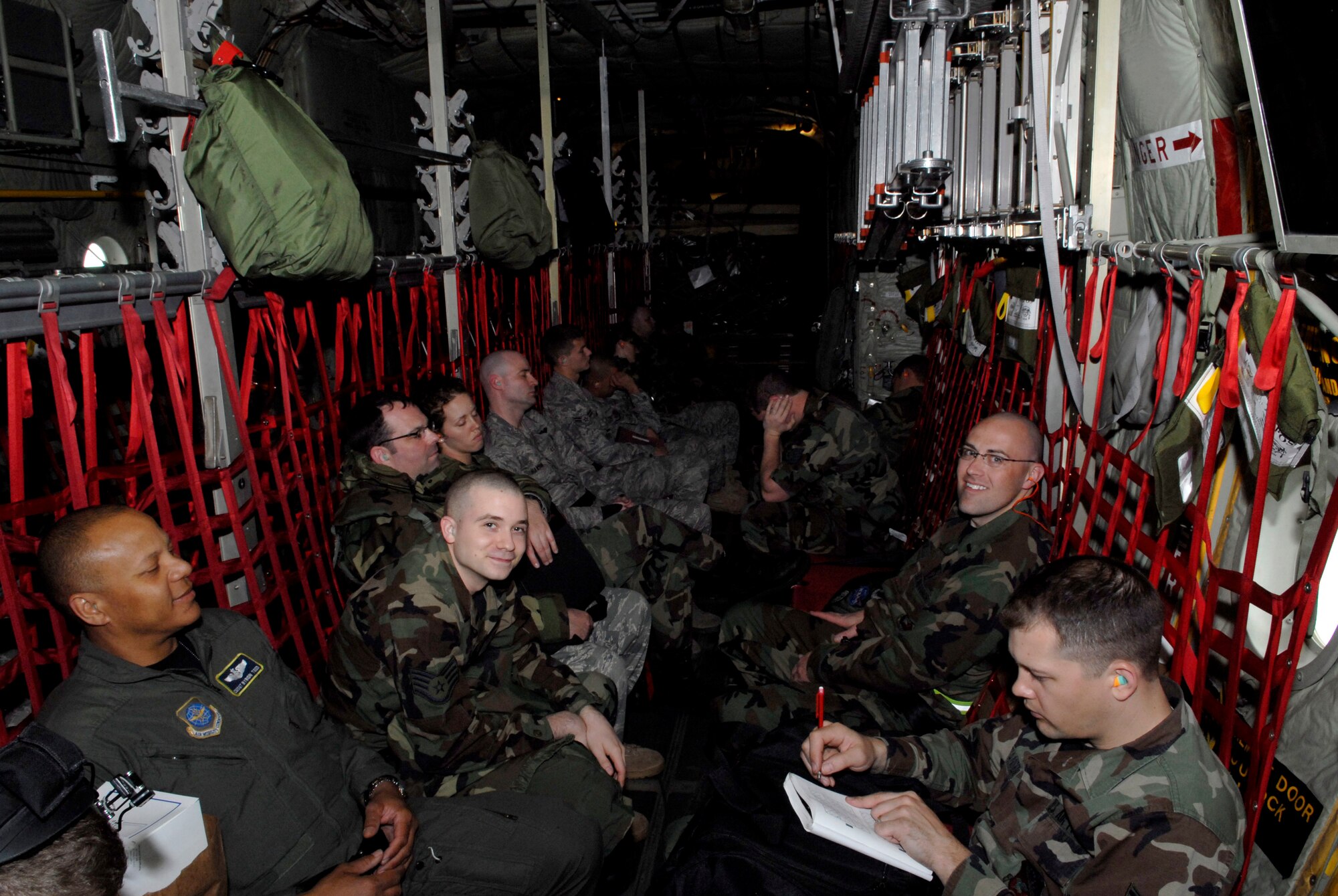Airmen of the 133rd Airlift Wing, St. Paul, Minn. fly in one of the unit's C-130 "Hercules" aircraft to a training mission at Volk Field, Wis. on May 13, 2009. Hundreds of men and women from the Minnesota Air National Guard unit joined otheres from Scott Air Force Base, Illinois for Readiness Safeguard in preparation for an Operational Readiness Inspection. USAF Official photo by Technical Sgt. Erik Gudmundson.