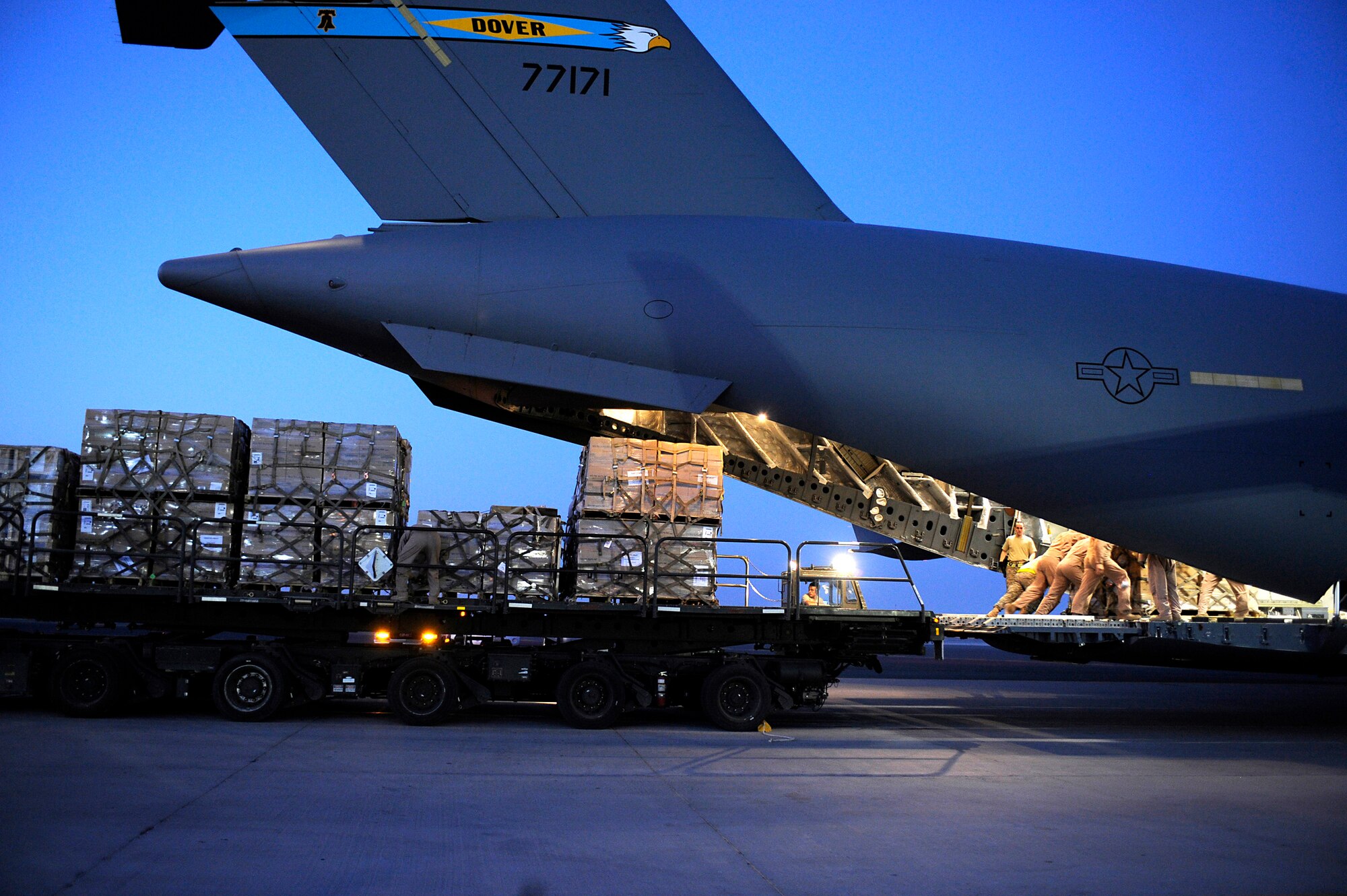Airmen load a pallet containing humanitarian relief supplies destined for Pakistan into the cargo bay of a C-17 Globemaster III May 20 at an undisclosed location in Southwest Asia. (U.S. Air Force photo/Staff Sgt. Shawn Weismiller)