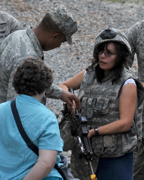MOODY AIR FORCE BASE, Ga. -- Military spouses from Moody had an opportunity to view the 820th Security Forces Group’s military operations in urban terrain village during the Moody Spouses Appreciation Day here May 15. Spouses were able to try on the heavy armor and equipment that is worn by the 820th SFG members. (U.S. Air Force Photo by Staff Sgt. Javier Cruz Jr.)