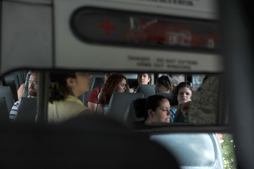 MOODY AIR FORCE BASE, Ga. -- After viewing a live fire demonstration and a simulated real world rescue by all of the specialized units from Moody, the military spouses welcomed the air conditionings cool breeze as they were transported to the next event during the Moody Spouses Appreciation Day here May 15. (U.S. Air Force Photo by Staff Sgt. Javier Cruz Jr.)