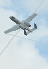 MOODY AIR FORCE BASE, Ga. -- An A-10C Thunderbolt II aircraft from the 75th Fighter Squadron, evades a simulated enemy missile launch during a demonstration held for the Moody Spouses Appreciation Day here May 15. Two A-10C Thunderbolt II aircrafts provided close air support for two HH-60G Pave Hawk helicopters that deployed three Pararescueman in the hopes of retrieving a downed pilot. (U.S. Air Force Photo by Staff Sgt. Javier Cruz Jr.)