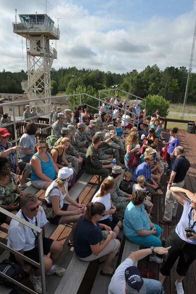 MOODY AIR FORCE BASE, Ga. -- Moody spouses gathered at the viewing area of Grand Bay Bombing and Gunnery Range for a live fire and rescue demonstration during the Spouses Appreciation Day here May 15. Members from the 75th Fighter Squadron, the 71st Rescue Squadron, the 41st Rescue Squadron and the 38th Rescue Squadron participated in the demonstration. (U.S. Air Force photo by Staff Sgt. Javier Cruz Jr.)