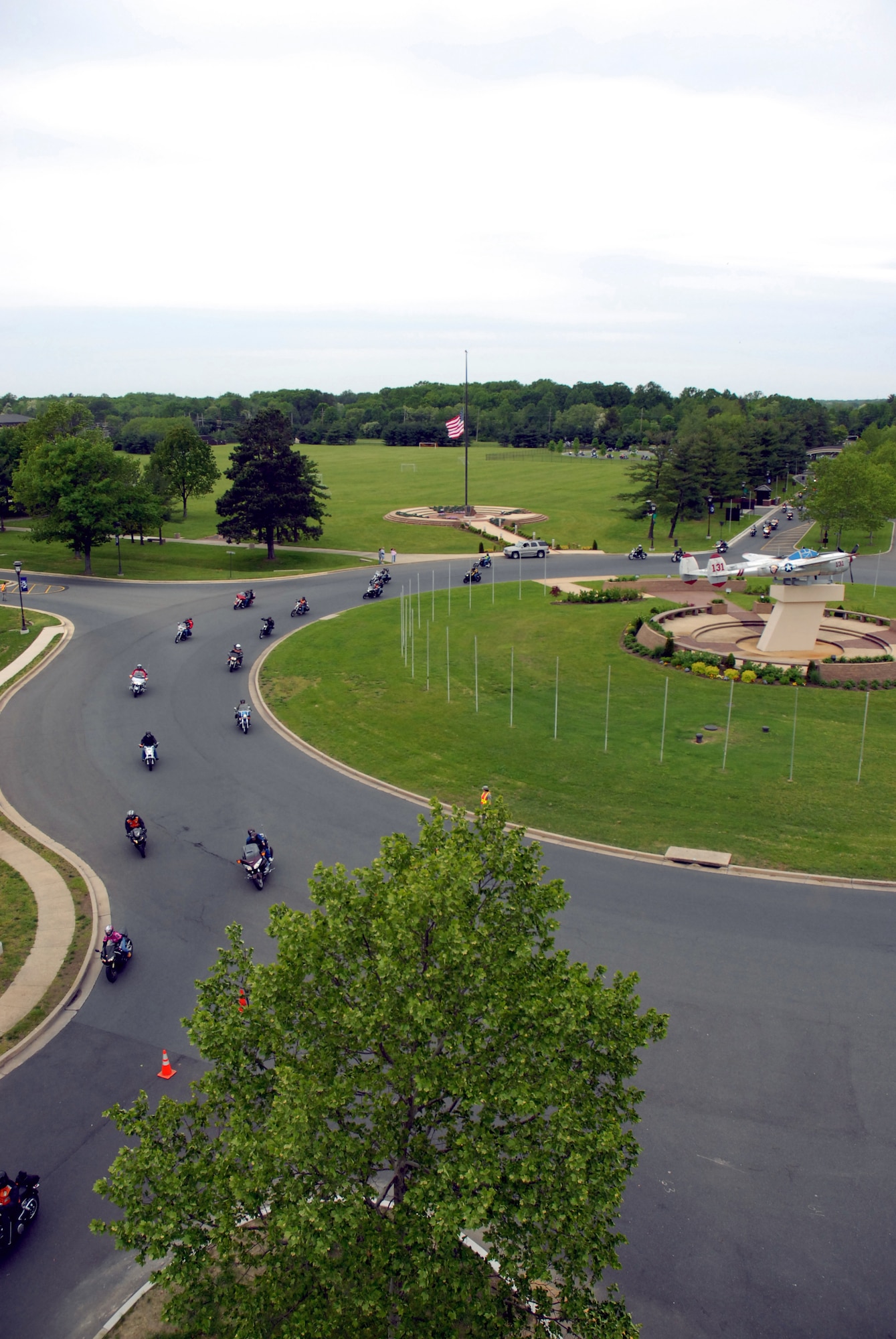 Motorcycle riders from the third annual Armed Forces Freedom Ride thunder past Pudgy Circle on Joint Base McGuire-Dix-Lakehurst, N.J., on May 17, 2009, as part of a 36-mile ride to show their support and raise money for the support of the U.S. Armed Forces stationed in New Jersey. More than 1,100 participants in the ride helped raise more than $45,000 for veterans' causes. (U.S. Air Force Photo/Staff Sgt. Paul R. Evans)