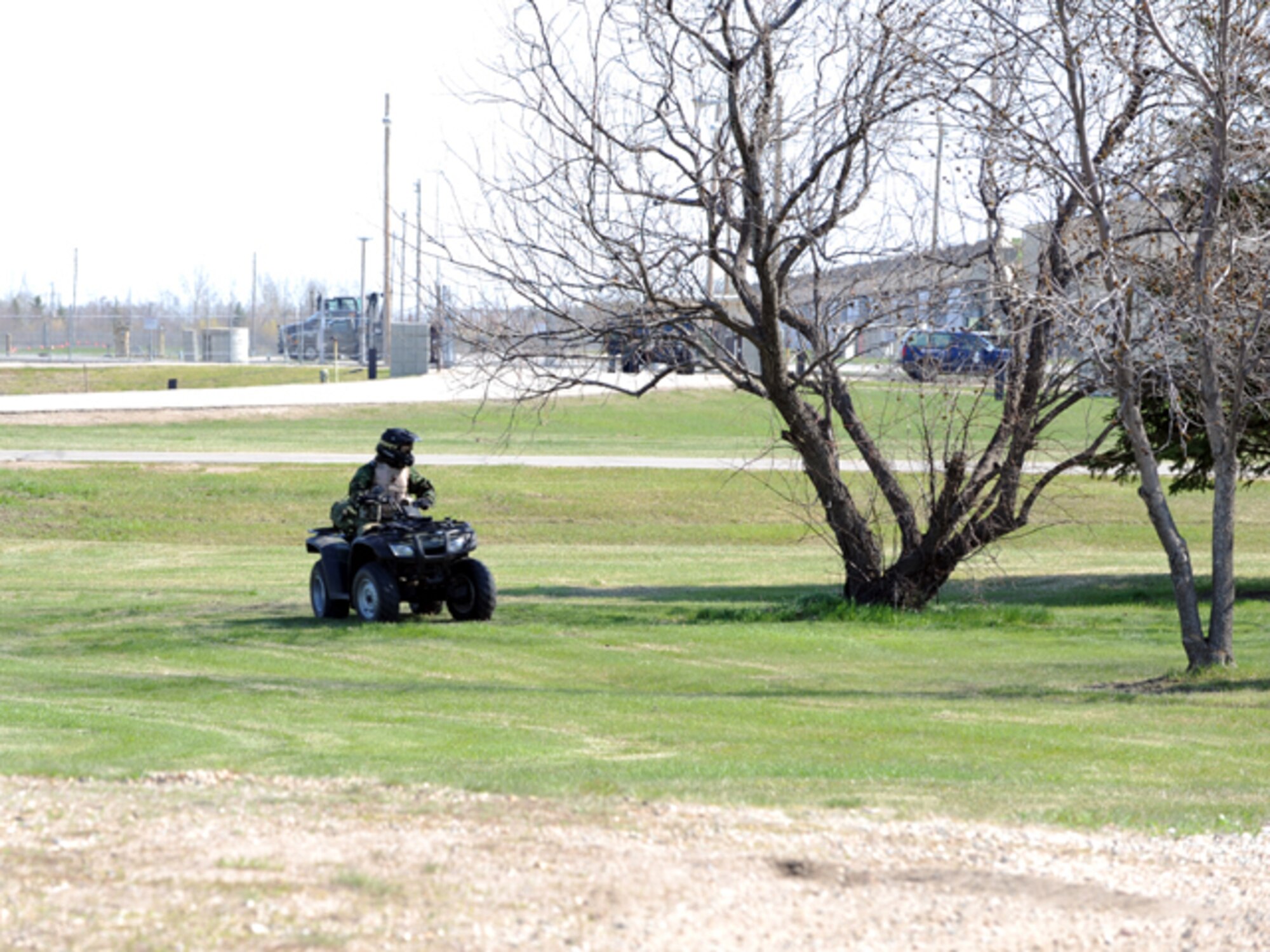 MINOT AIR FORCE BASE, ND – 5th Security Forces Squadron personnel conduct security checks along the proposed route for a weapons convoy during the recent Nuclear Surety Inspection here May 16.  An NSI is designed to evaluate a unit's readiness to execute nuclear operations.  Areas to be evaluated during the NSI include operations, maintenance, security, and support activities needed to ensure the wing performs its mission in a safe, secure and reliable manner.  This no-notice inspection is expected to conclude May 22. (U.S. Air Force photo by Staff Sgt. Keith Ballard)