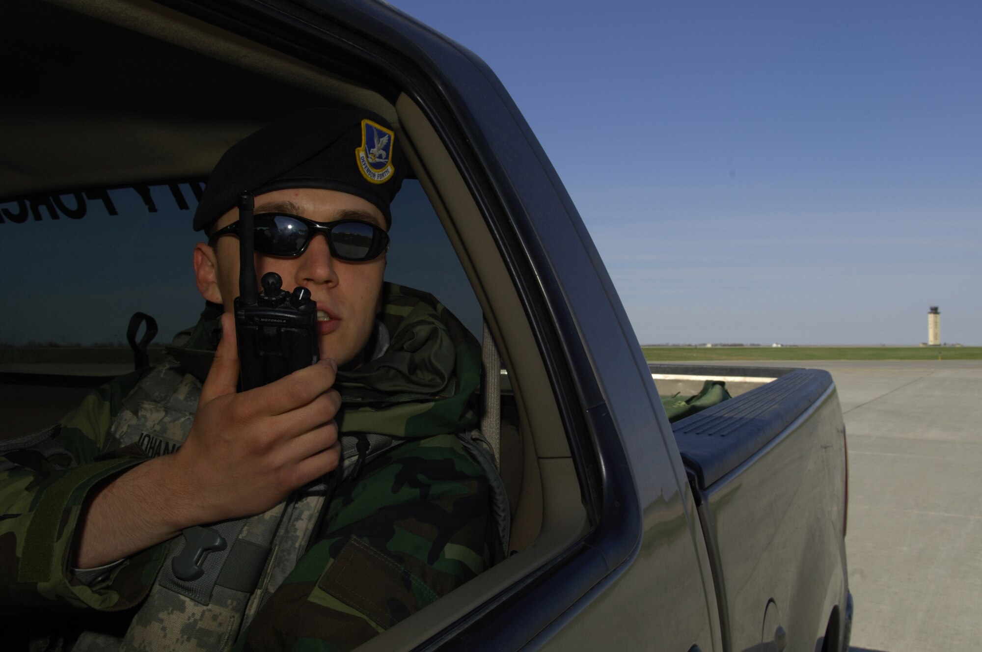 MINOT AIR FORCE BASE, ND -- Airman 1st Class Christopher Johanson, 5th Security Forces Squadron, entry controller, radios during the Nuclear Surety Inspection May 16. An NSI is designed to evaluate a unit's readiness to execute nuclear operations.  Areas to be evaluated during the NSI include operations, maintenance, security, and support activities needed to ensure the wing performs its mission in a safe, secure and reliable manner.  This no-notice inspection is expected to conclude May 22. (U.S. Air Force photo by Tech. Sgt. Lee Osberry)