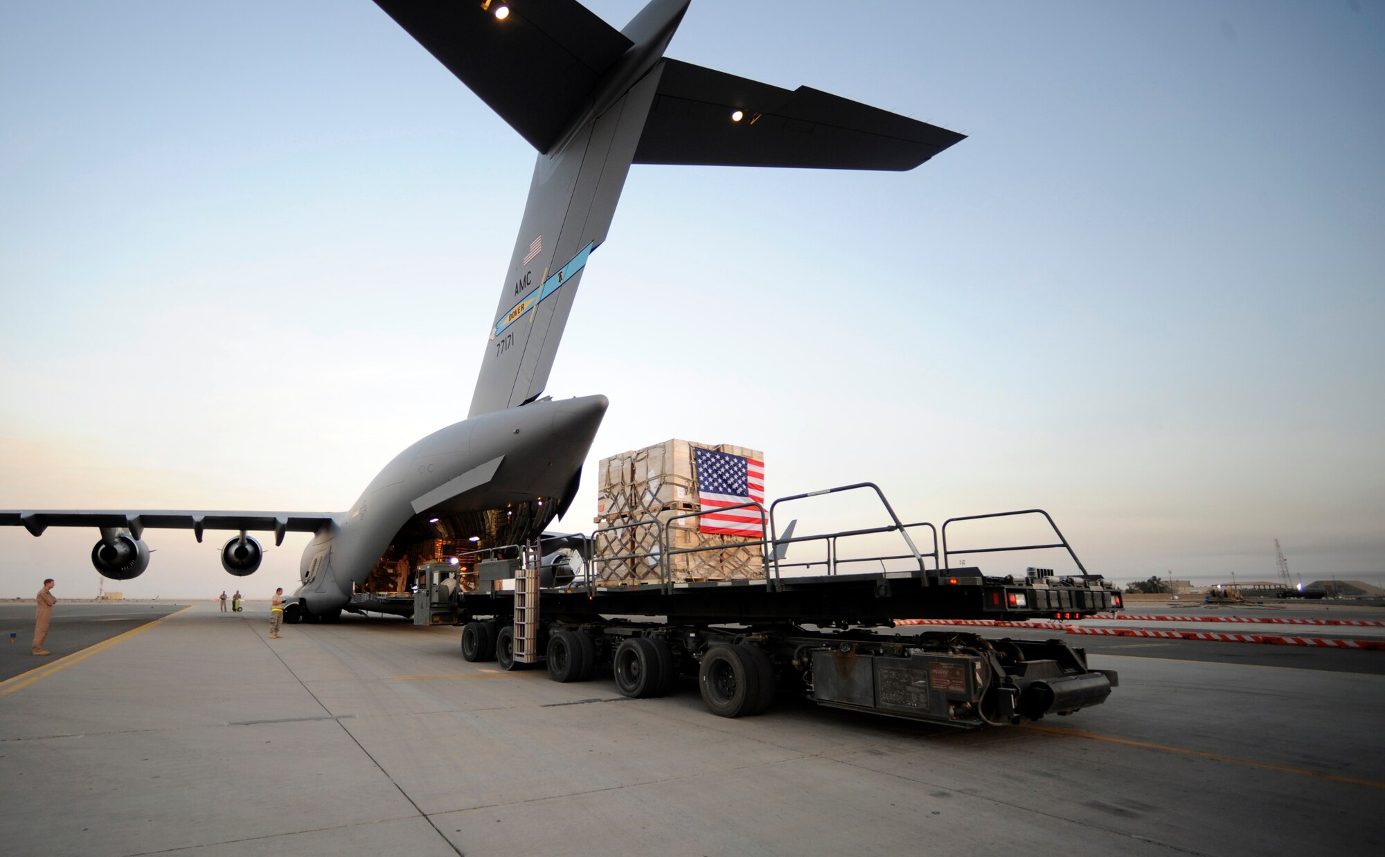 A pallet containing humanitarian relief supplies destined for Pakistan is prepared to be loaded into the cargo bay of a C-17 Globemaster III May 20, 2009, at an undisclosed location in Southwest Asia. (U.S. Air Force photo by Staff Sgt. Shawn Weismiller)