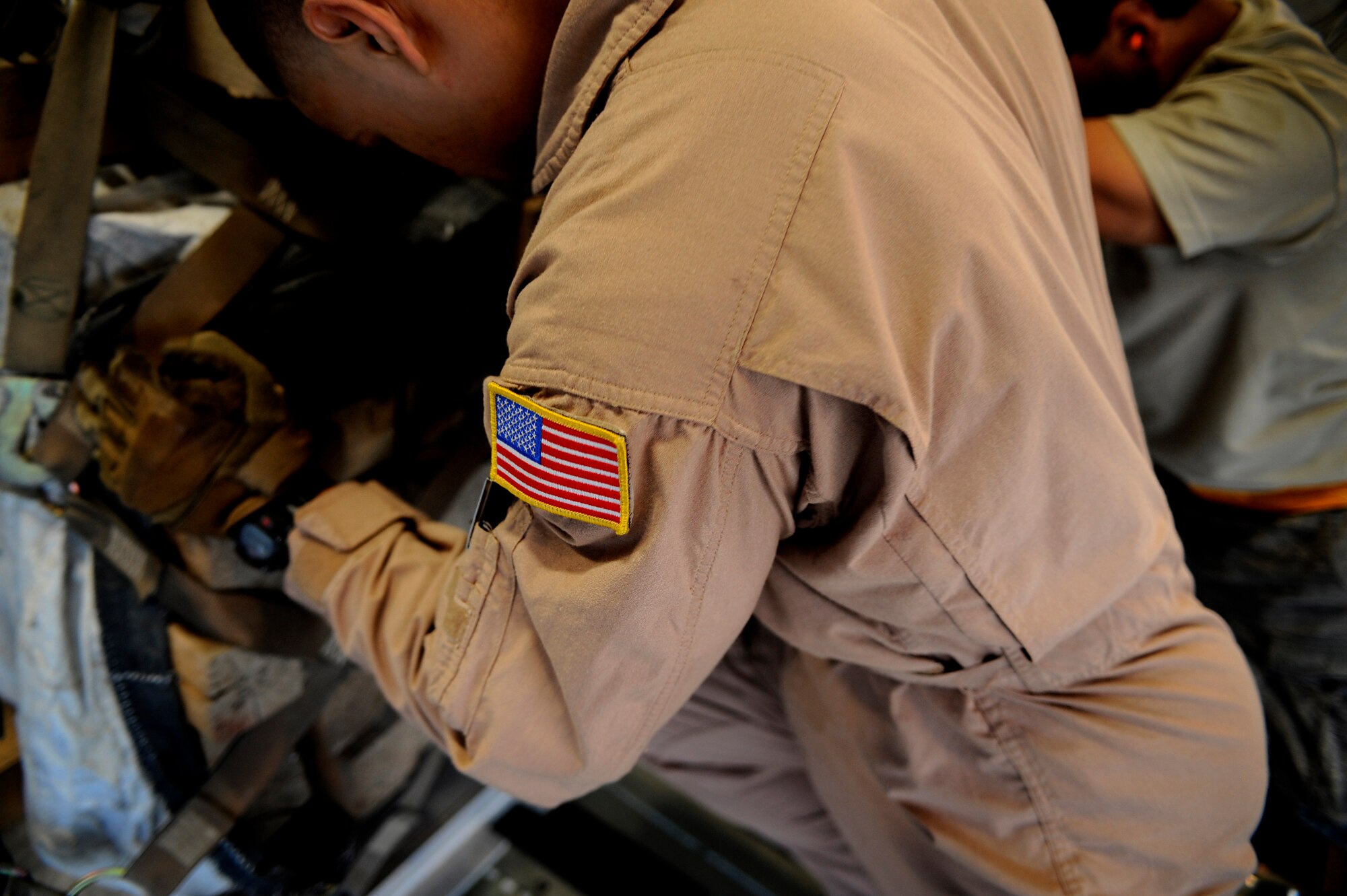 A U.S. Air Force Airman loads a pallet containing humanitarian relief supplies destined for Pakistan into the cargo bay of a C-17 Globemaster III May 20, 2009, at an undisclosed location in Southwest Asia. (U.S. Air Force photo by Staff Sgt. Shawn Weismiller)