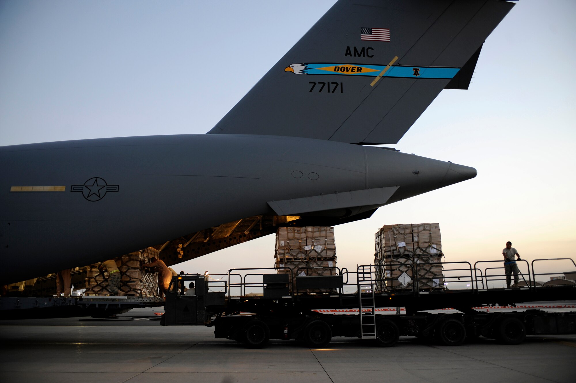 U.S. Air Force Airmen load a pallet containing humanitarian relief supplies destined for Pakistan into the cargo bay of a C-17 Globemaster III May 20, 2009, at an undisclosed location in Southwest Asia. (U.S. Air Force photo by Staff Sgt. Shawn Weismiller)