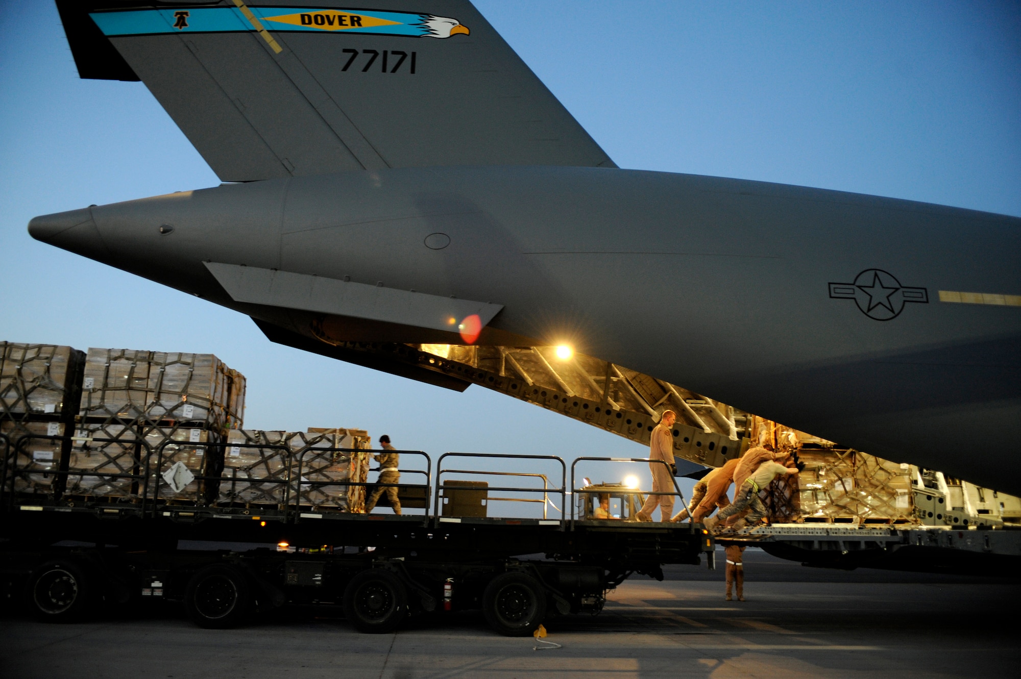 U.S. Air Force Airmen load a pallet containing humanitarian relief supplies destined for Pakistan into the cargo bay of a C-17 Globemaster III May 20, 2009, at an undisclosed location in Southwest Asia. (U.S. Air Force photo by Staff Sgt. Shawn Weismiller)
