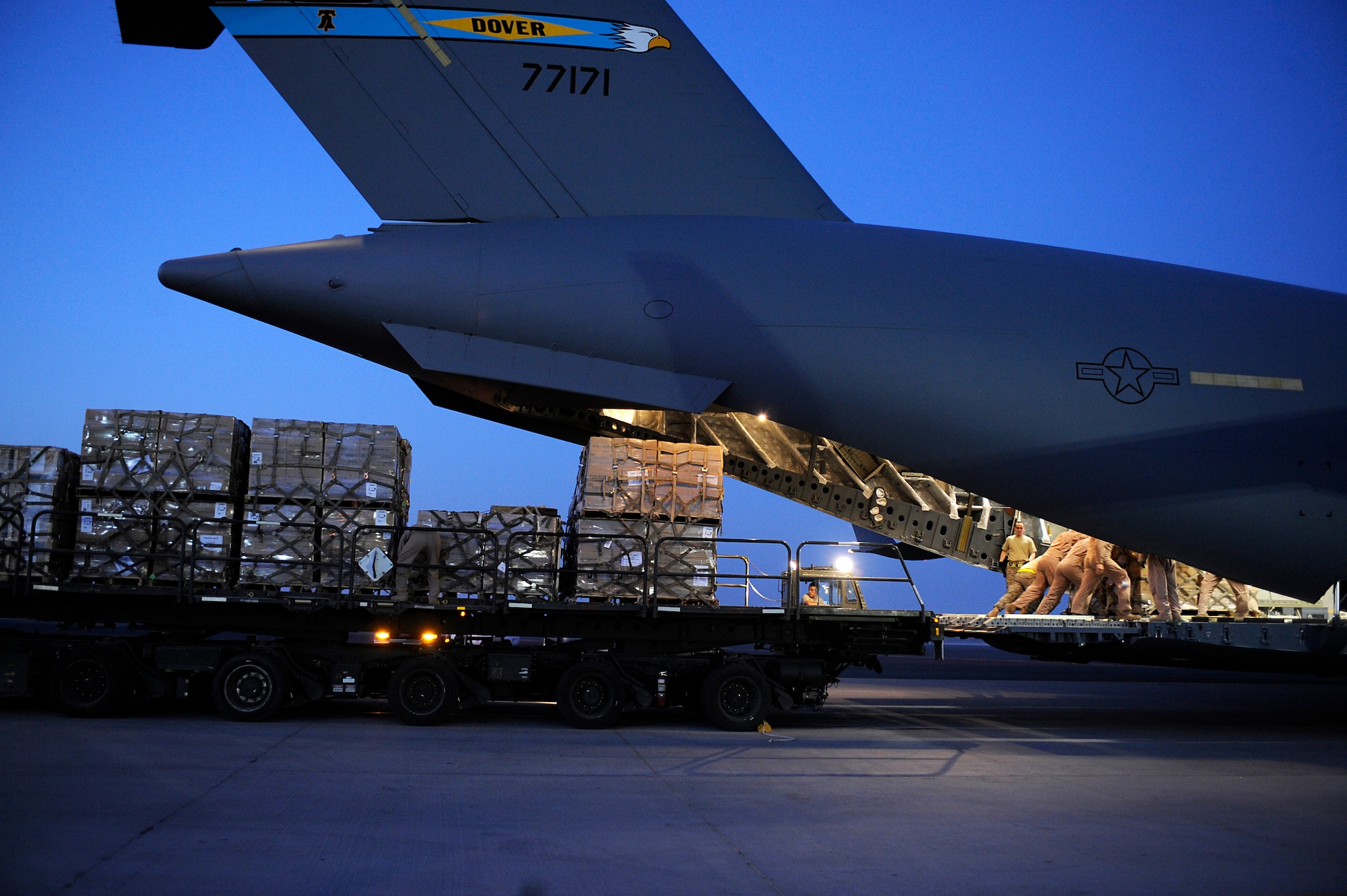 U.S. Air Force Airmen load a pallet containing humanitarian relief supplies destined for Pakistan into the cargo bay of a C-17 Globemaster III May 20, 2009, at an undisclosed location in Southwest Asia. (U.S. Air Force photo by Staff Sgt. Shawn Weismiller)
