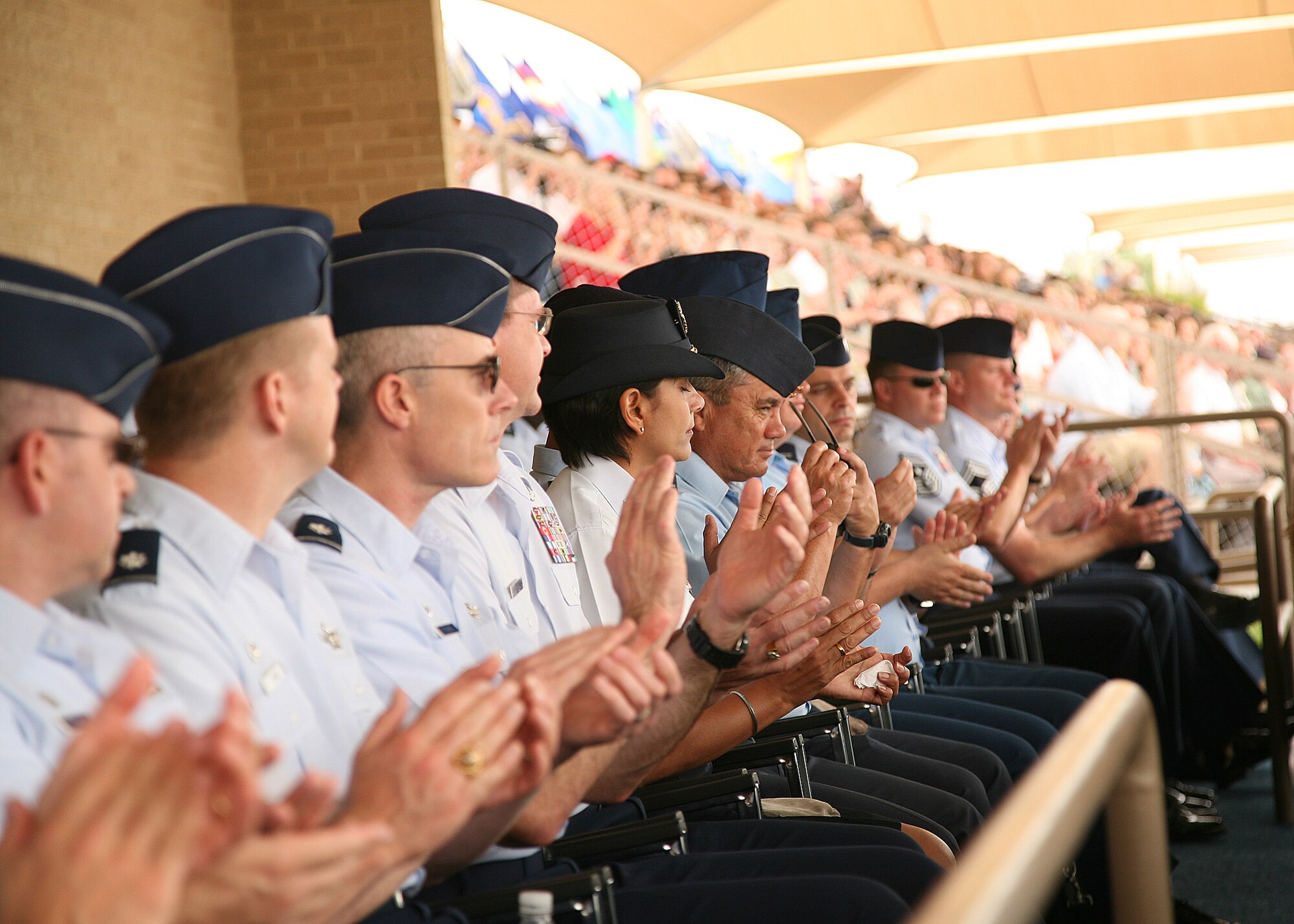 International senior enlisted leaders observe hundreds of Basic Military Training enlistees graduate during a parade May 15 at Lackland Air Force Base, Texas. The 2009 Worldwide Senior Enlisted Leaders Summit was hosted by U.S. Air Force senior enlisted leaders to give their foreign counterparts a look at a U.S. Air Force enlisted member's career from start to finish. (U.S. Air Force photo/Robbin Cresswell)