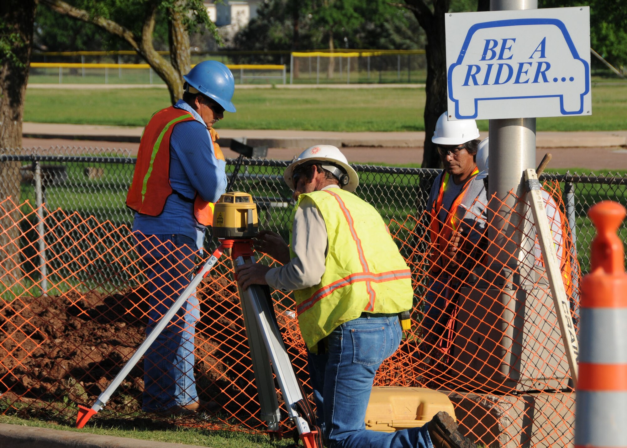ALTUS AIR FORCE BASE, Okla. – Construction workers start renovations on the main gate, installing pop up barriers to increase force protection. This construction will slow traffic and reduce the inbound and outbound lanes to one lane in each direction until June 26. (U.S. Air Force photo/Senior Airman Marianne E. Lane)