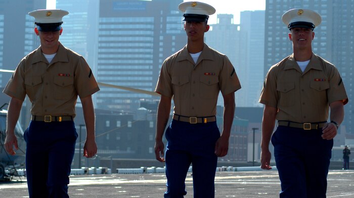 Marines from Special Marine Air Ground Task Force New York walk down the flight line aboard USSIwo Jima after arriving at Manhattan for Fleet Week, May 20.