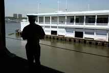 NEW YORK – Cpl. Jerry Franklin waits for his buddies on the hangar deck of the USS Iwo Jima. Franklin is a Field Radio Operator with Special Purpose Marine Air Ground Task Force New York May 20. The Marines and Sailors of SPMAGTF—New York are participating in Fleet Week May 20-28.