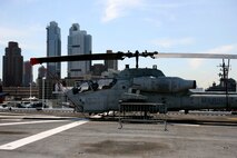 NEW YORK – An AH-1W Cobra from Special Purpose Marine Air Ground Task Force New York sits on the flight deck of the USS Iwo Jima in front of the New York Skyline May 20. The Marines and Sailors of SPMAGTF—New York are participating in Fleet Week May 20-28.
