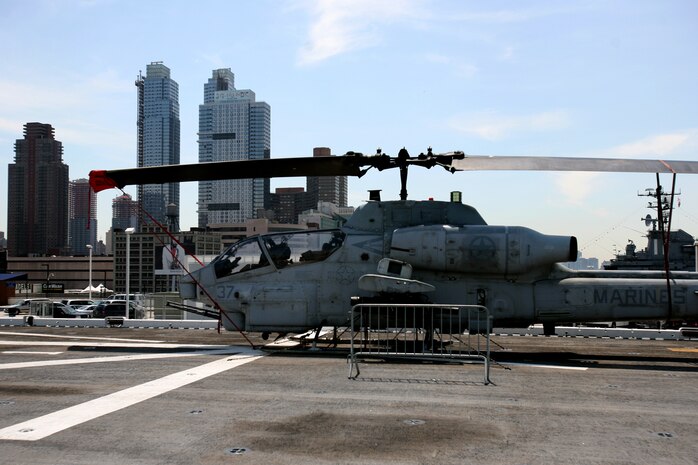 NEW YORK – An AH-1W Cobra from Special Purpose Marine Air Ground Task Force New York sits on the flight deck of the USS Iwo Jima in front of the New York Skyline May 20. The Marines and Sailors of SPMAGTF—New York are participating in Fleet Week May 20-28.