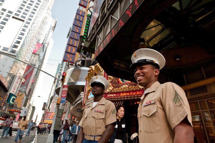 Cpl. John Brown, artillerymen of Dalton, Ga., and Cpl. Jamal Fredericksen, a food services specialist of Christian St. Croix, both part of 3rd Battalion, 10th Marine Regiment, 2nd Marine Division, enjoy a walk through Times Square, May 20. Brown and Fredericksen are in Manhattan as part of Fleet Week 2009. "I love New York, this has already been a great experience, and we just got here."