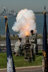 NEW YORK CITY -- Soldiers at Fort Hamilton, N.Y., give the Parade of Sail ships a 17-gun salute, May 20. The Navy and Marine Corps are in New York City from May 20-27 for Fleet Week, a week long display of military equipment and personnel. (Official Marine Corps photo by Sgt. Randall A. Clinton)