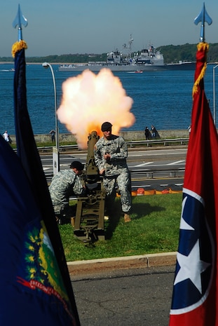 NEW YORK CITY -- Soldiers at Fort Hamilton, N.Y., give the Parade of Sail ships a 17-gun salute, May 20. The Navy and Marine Corps are in New York City from May 20-27 for Fleet Week, a week long display of military equipment and personnel. (Official Marine Corps photo by Sgt. Randall A. Clinton)