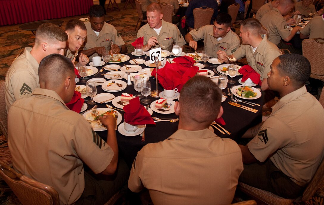 Marines from Marine Corps Base Hawaii-Kaneohe Bay enjoy food during the 24th Annual Military Recognition Luncheon May 21 at the Hilton Hawaiian Village here. The luncheon, held during Military Appreciation Month, featured various speakers and a full course lunch for the hundreds of service members and guests in attendance.