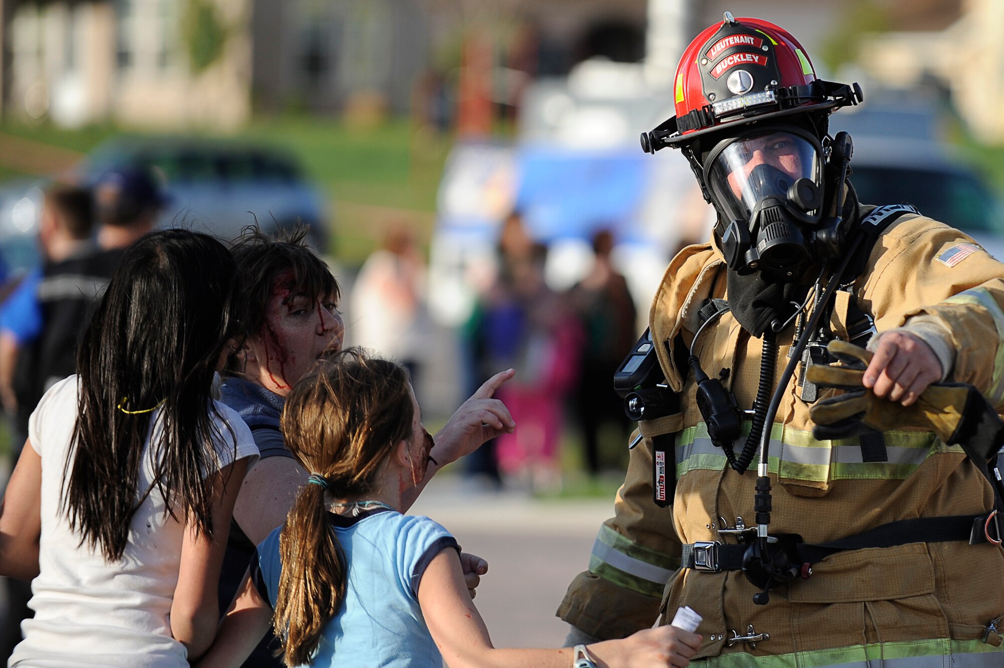 BUCKLEY AIR FORCE BASE, Colo. -- The Buckley Fire Department responded to the community center at Buckley Family Housing after a mock fuel-tanker truck exploded at a mock wedding May 15, in support of the Vigilant Front Range exercise. The exercise involved federal, state and local agencies working with base agencies to test plans and build understanding, trust and relationships essential in the fast-paced environment of major disasters.  (U.S. Air Force photo by Tech. Sgt. Jeromy Cross)