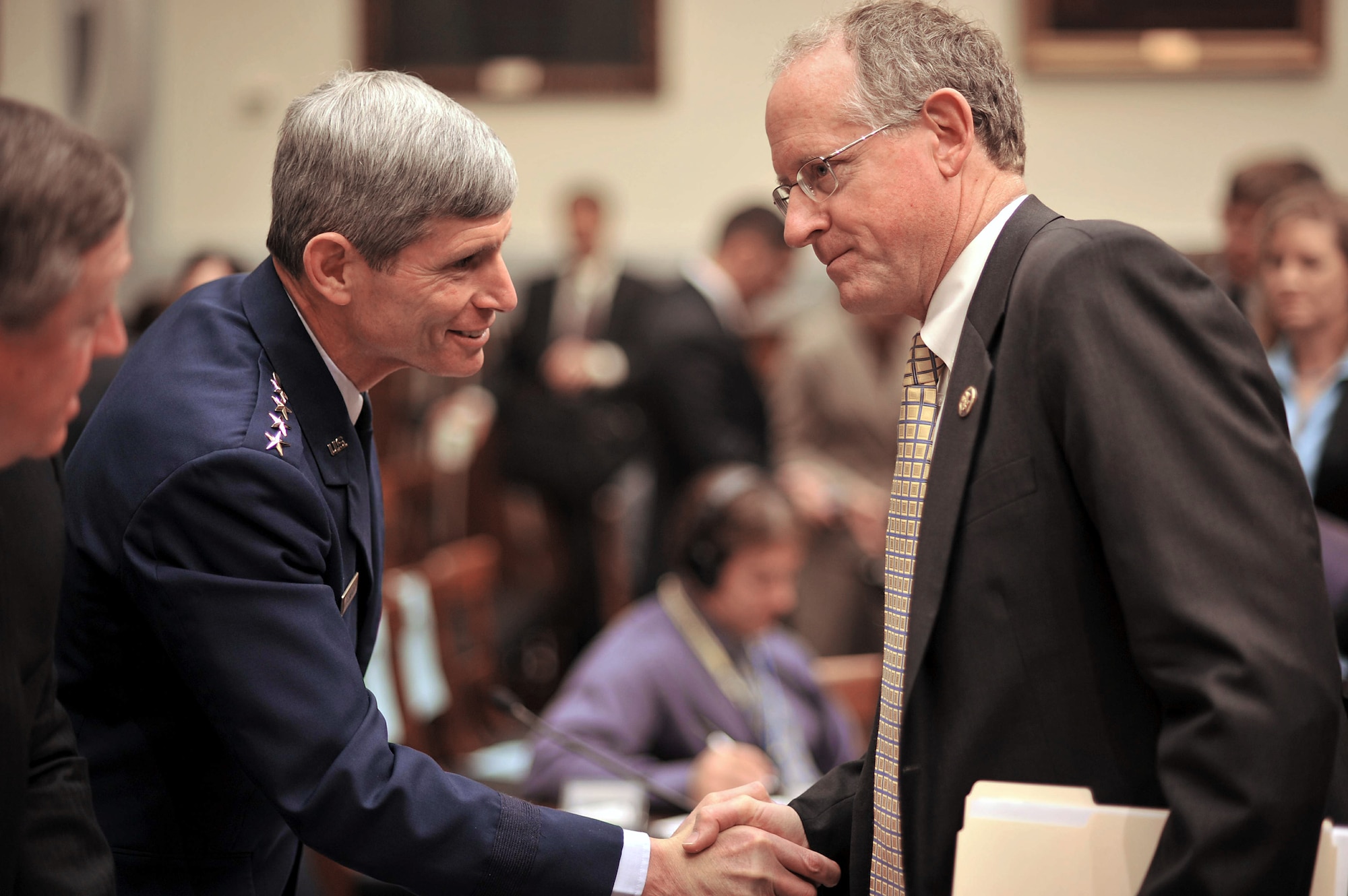 Air Force Chief of Staff Gen. Norton Schwartz (left) is greeted by Congressman Mike Conaway after giving testimony with Secretary of the Air Force Michael Donley before the U.S. House Armed Services Committee on the current Air Force posture May 19 in the Rayburn Building in Washington, D.C. The two Air Force leaders spent most of the week before both the House and Senate providing feedback with regard to the upcoming budget and current and projected capabilities. (U.S. Air Force photo/Scott M. Ash)
