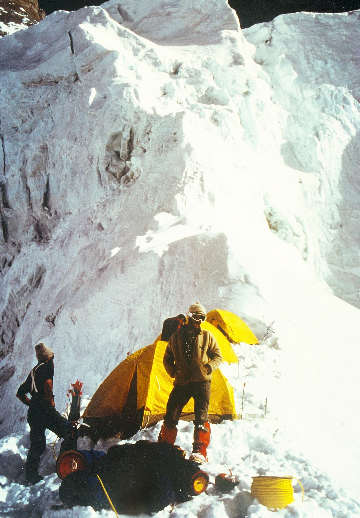 Maynard Cohick, (left) Gil Harder, (right) and Eric Roberts (background) organize camp on Dutch Rib, a knife-edge ridge on Mt. Annapurna in Nepal on Sept. 19, 1979. Later that night, high above this camp, an extensive field of ice and snow gave way, crashing down into the crevasse to the left. The massive over-pressure of air caused by the avalanche blew the climbers into a 6,000-foot-deep crevasse on the other side of the ridge, killing all three. Maynard Cohick was the father of Master Sgt. Steve Cohick, an Air Force reservist now with the 442nd Fighter Wing at Whiteman Air Force Base, Mo. (Photo courtesy of Master Sgt. Steve Cohick)