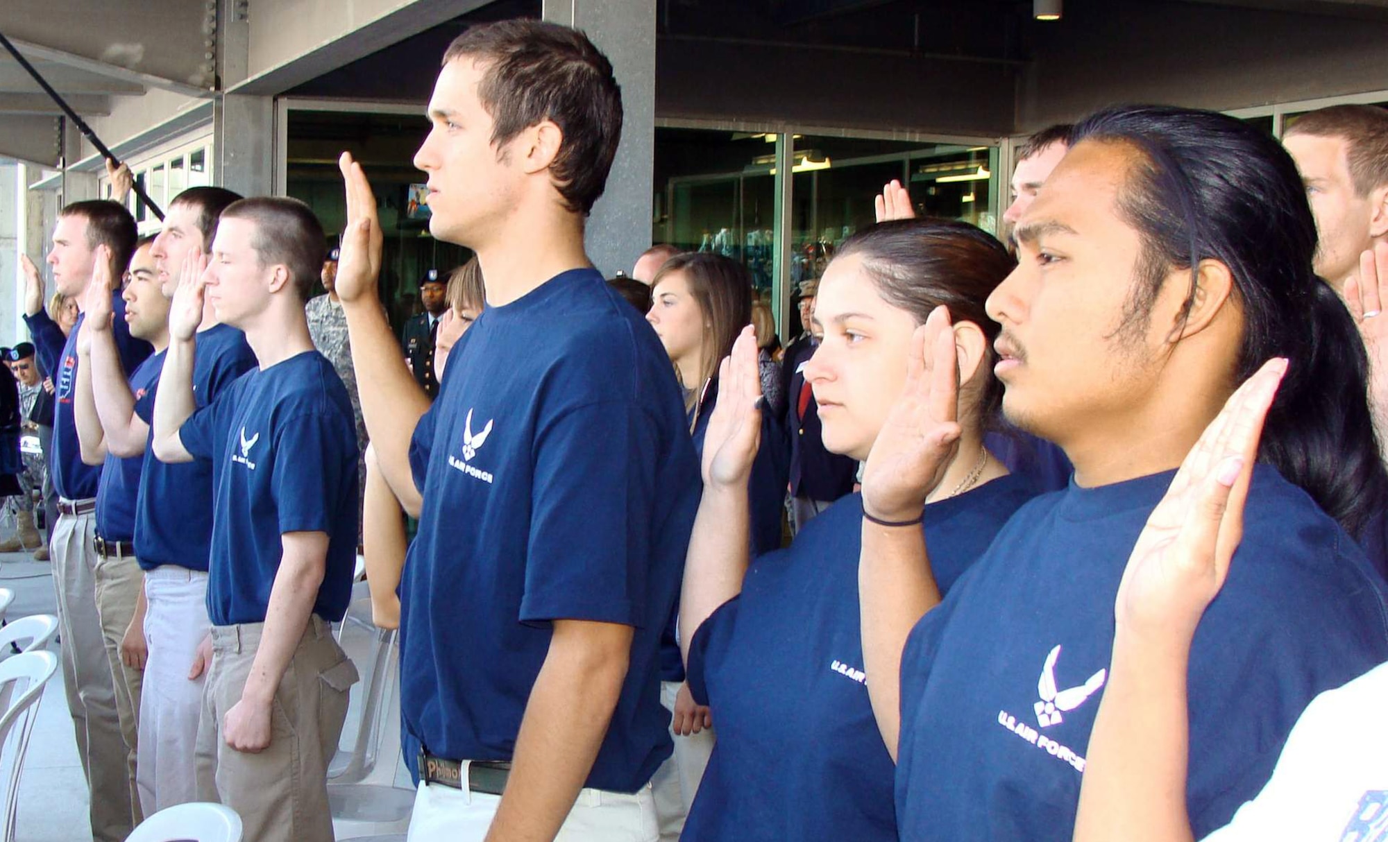 Six members of the Air Force delayed entry program recite the oath of enlistment administered by Indiana Senator Richard Lugar during a ceremony May 17 at the Indianapolis Motor Speedway. The speedway recognizes the contributions of military men and women annually during Armed Forces Day weekend. The Indianapolis 500 May 24 features the debut of an Air Force-themed Indy car driven by rookie Rafael Matos, who qualified 12th and starts from the fourth row. (U.S. Air Force photo/Daniel Elkins)