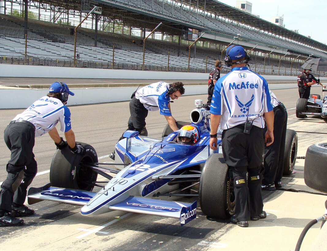 The Luczo Dragon Racing team completes a pit stop during practice by No. 2 car driver Rafael Matos May 16 at the Indianapolis Motor Speedway. Matos is driving the Air Force-themed Indy car in the Indianapolis 500 May 24 after qualifying 12th with the fastest time of five rookies in the field. (U.S. Air Force photo/Daniel Elkins) 